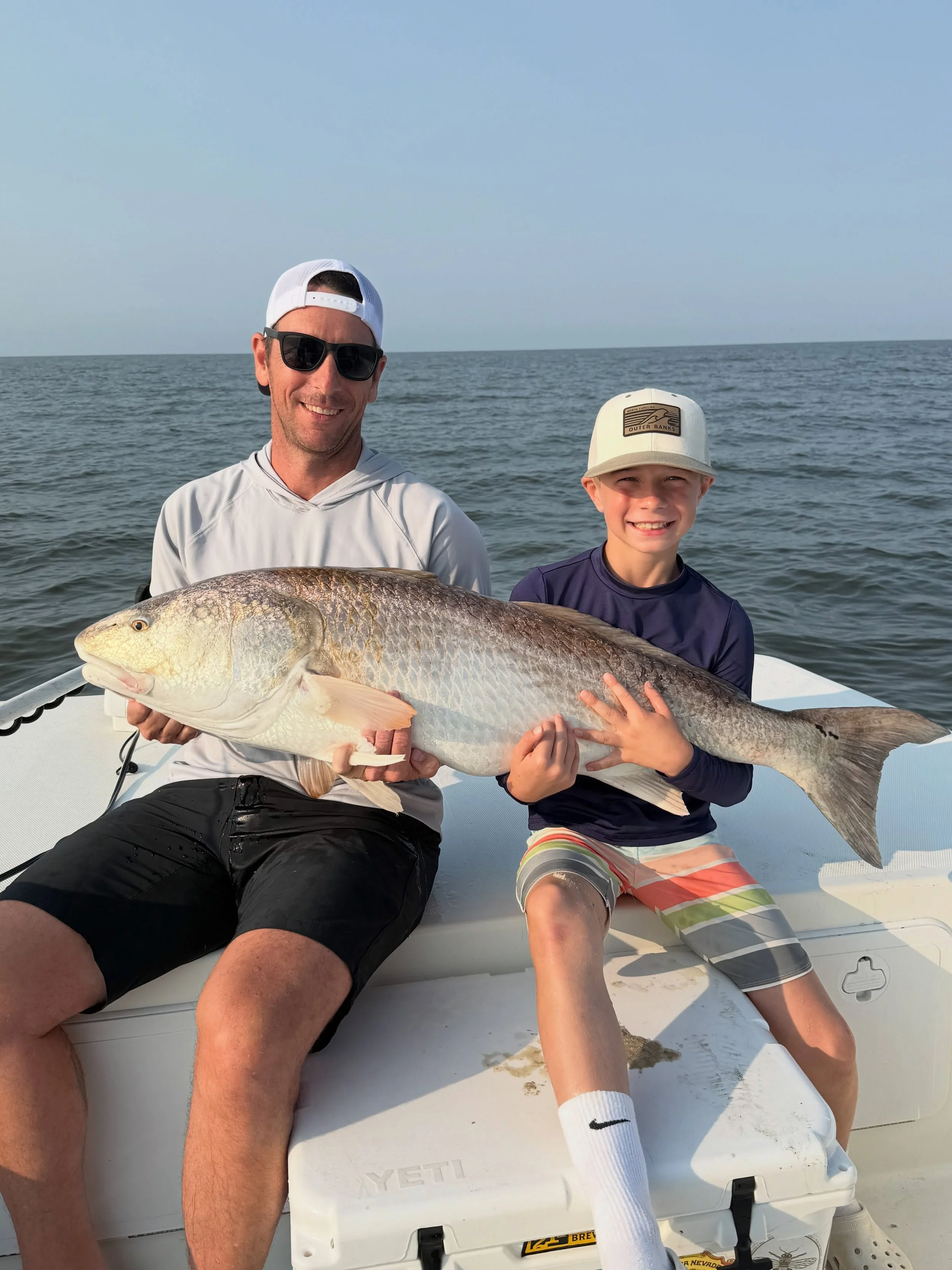 Non stop action this morning! We caught our limit of gray trout pretty quick, right after that little man hooked a 46 inch red drum! We finished up the trip catching black drum, sheepshead, spadefish, spot and croaker. Give me a call to get in on the