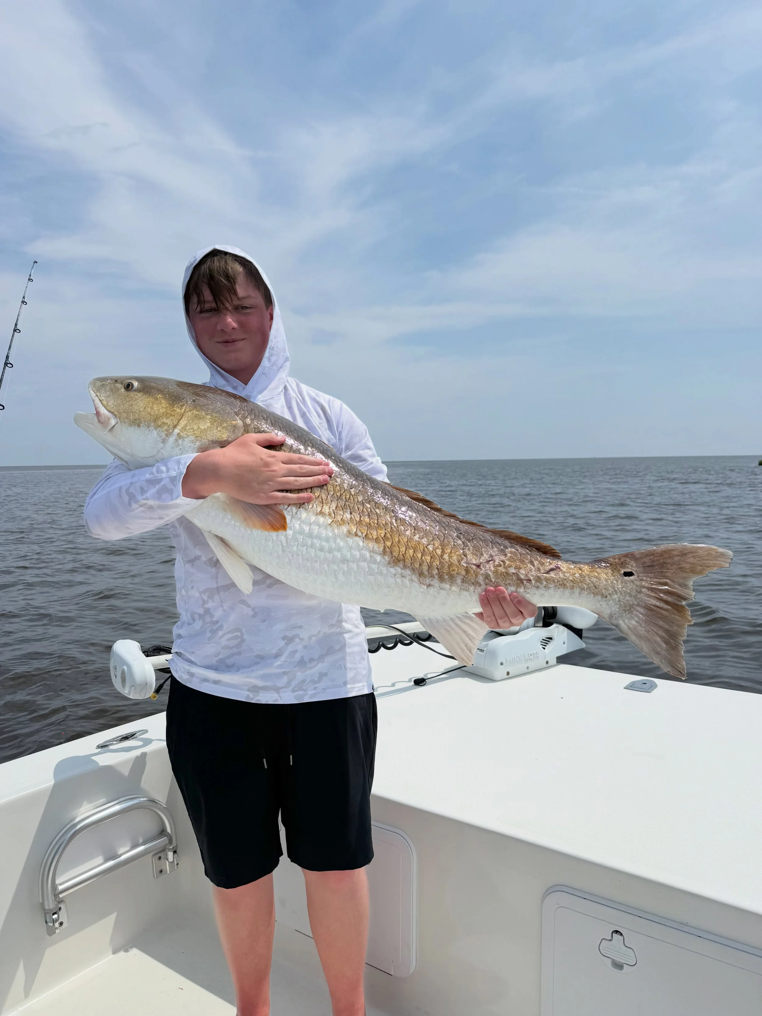 Father and son this afternoon on a half day trip and they both caught their personal best red drum!