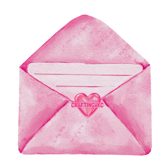 A pink watercolor envelope with a heart-shaped sticker that reads 'CRAFTINGWKC'