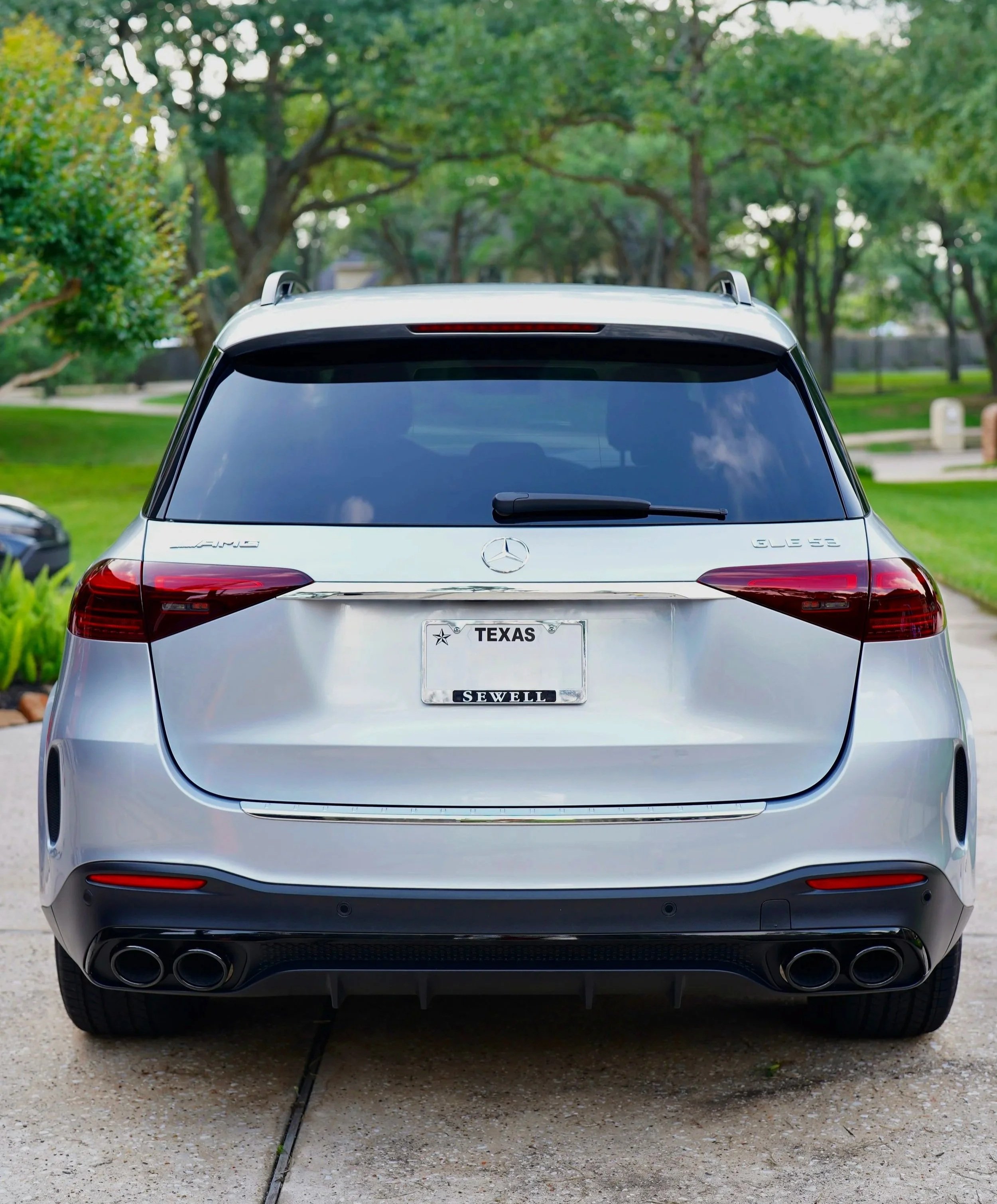 Mercedes AMG after a Premium Detail in a Houston driveway