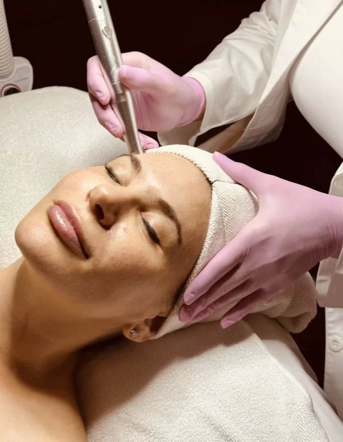 Woman receives a Targeted Facial at Avila Skin Studio