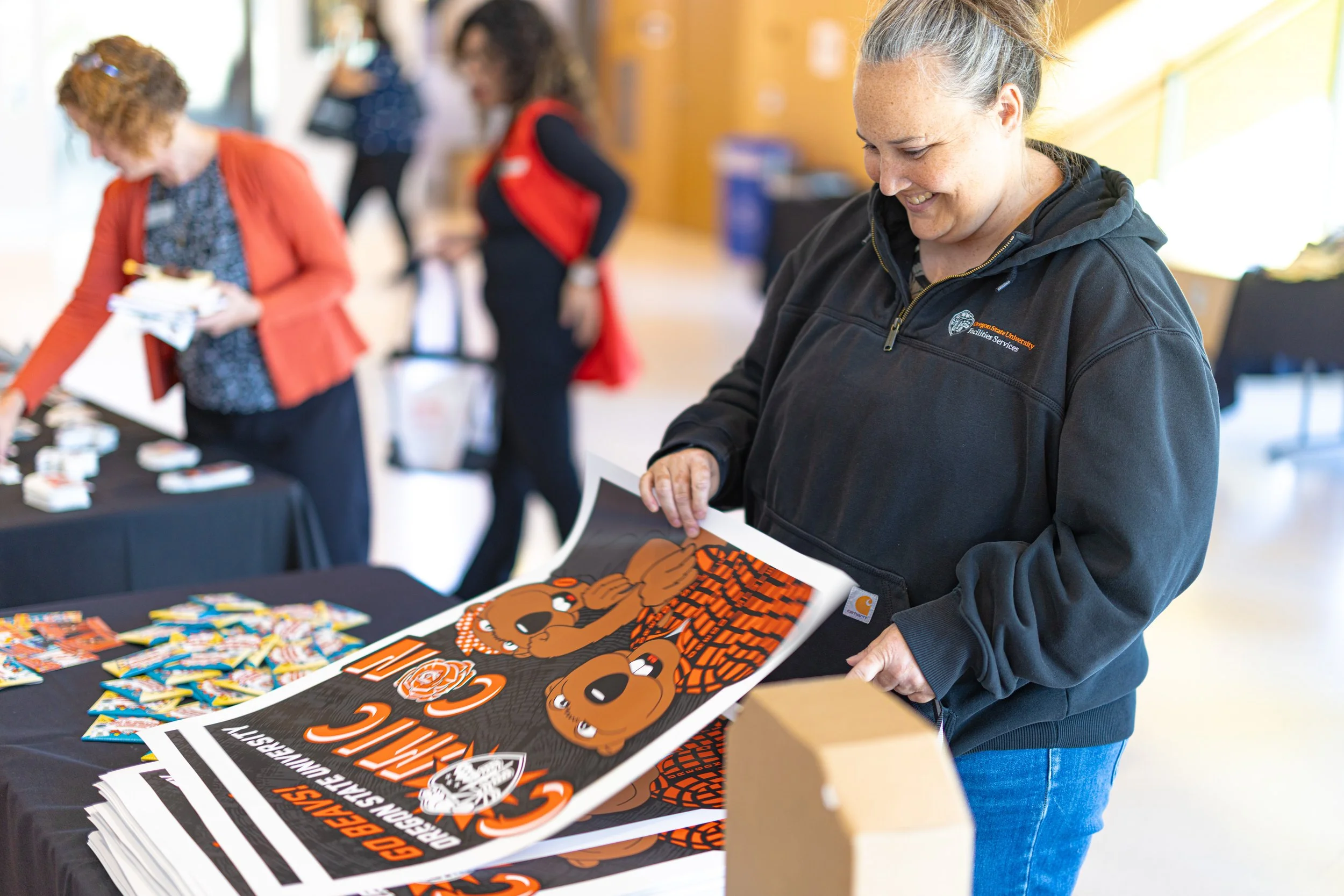 Women grabbing poster.jpg