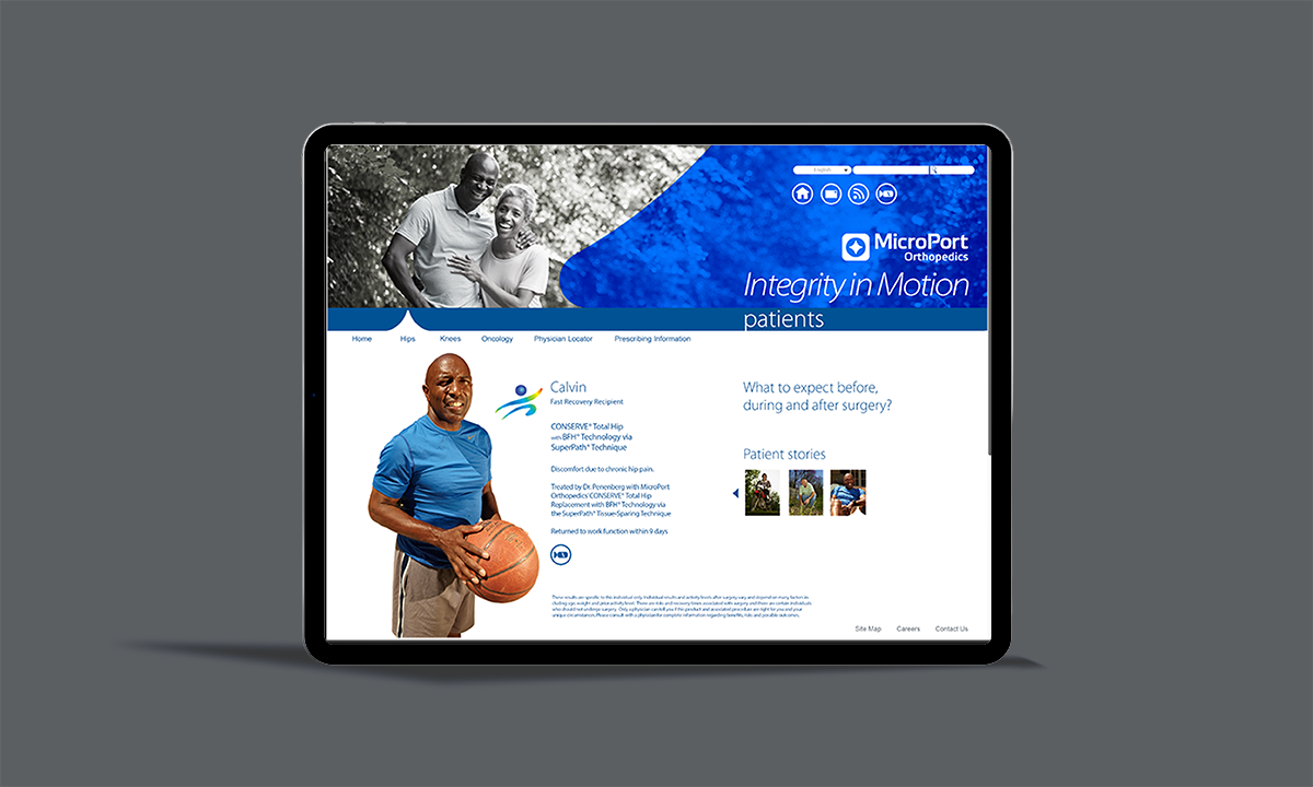 Tablet displaying medical website for MicroPort Orthopedics with a man holding a basketball, blue and white color scheme, and a black-and-white photo of a couple smiling in the background.
