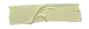 Torn piece of masking tape on a white background.