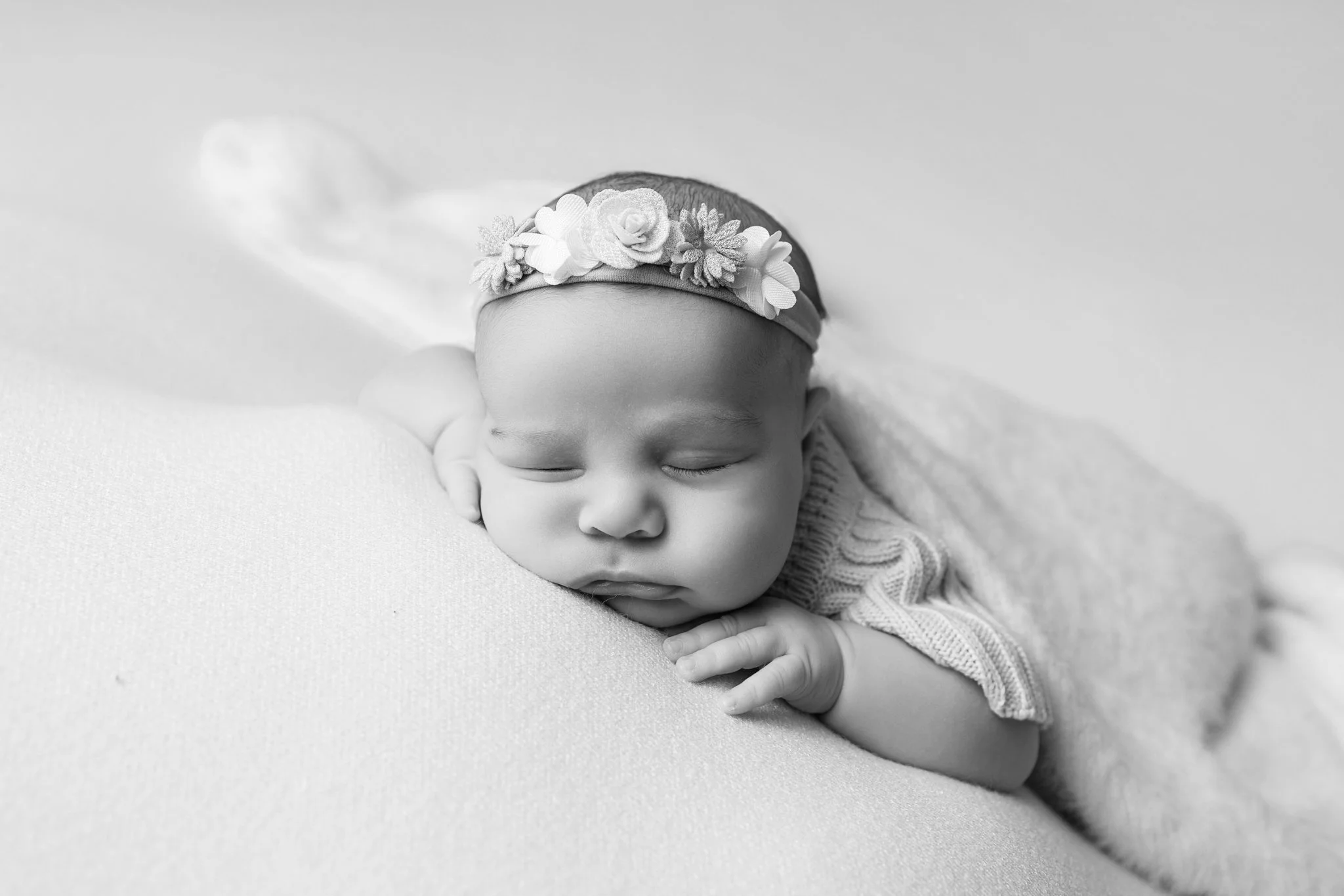 Newborn laying on a soft blanket at her Newborn photography session in Bacchus Marsh