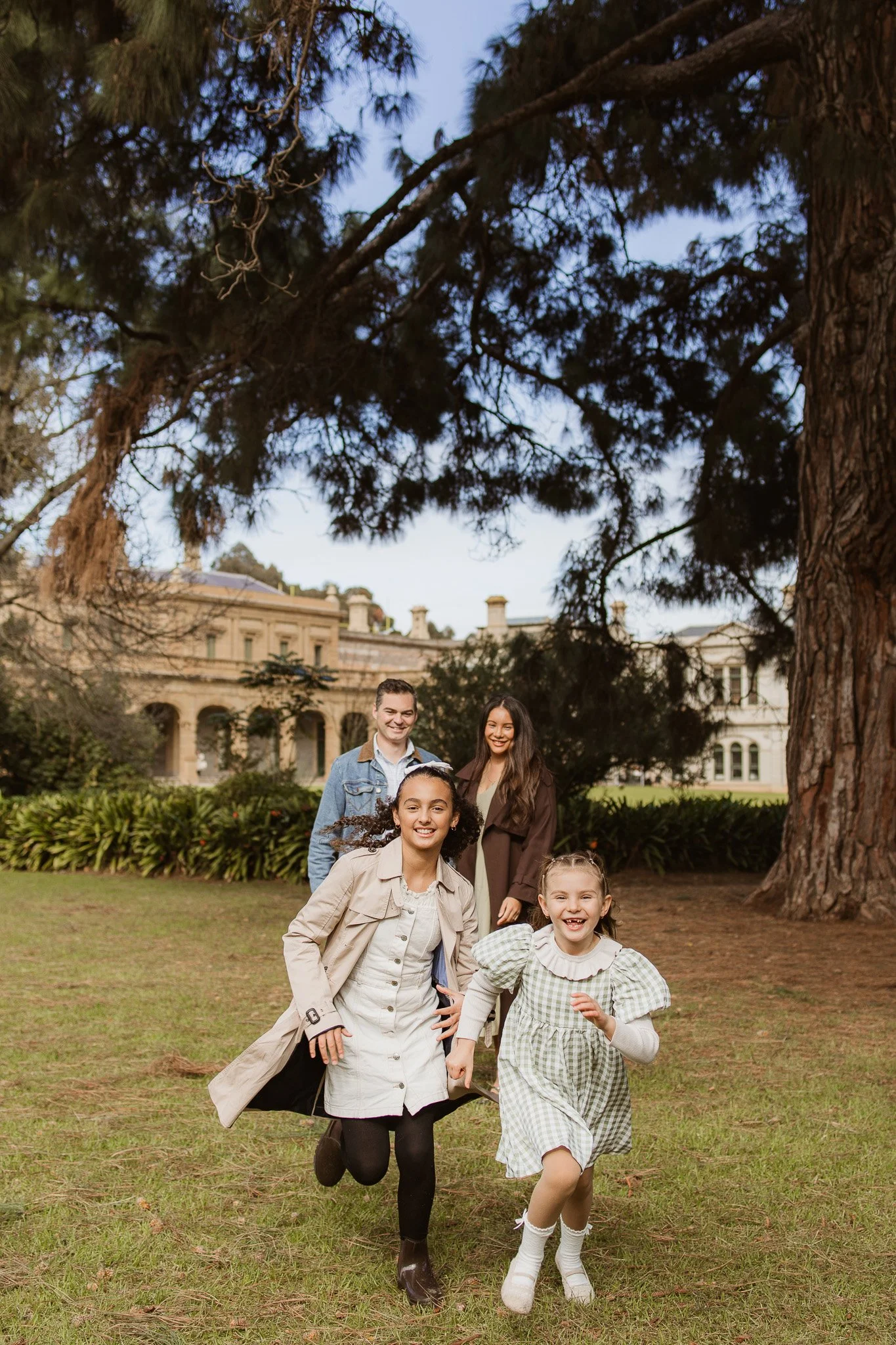 Family of four photographed together outdoor family photography Melton Werribee Mansion