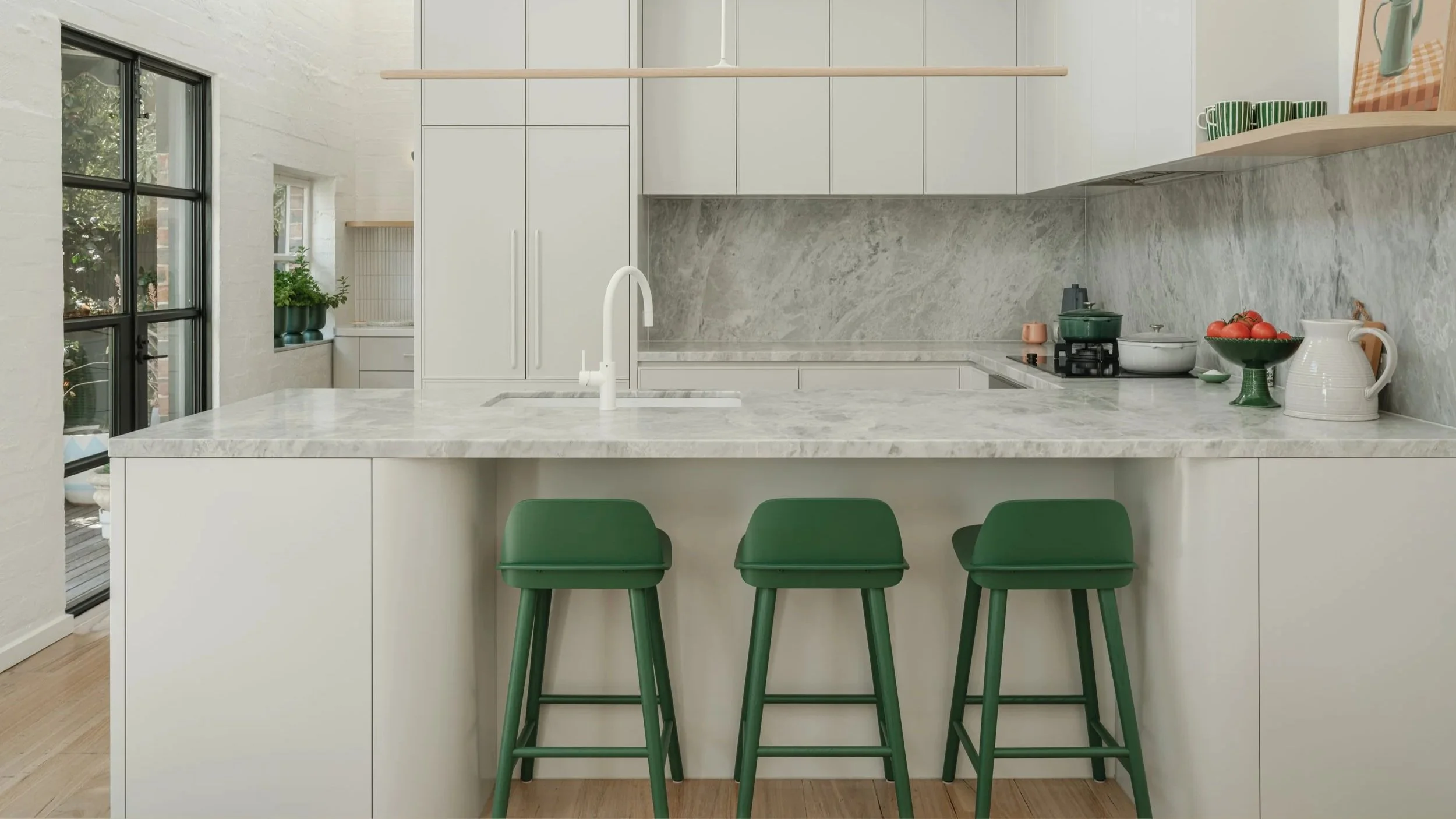 Stinton Project — kitchen renovation with marble benchtop, green stools and natural light, Kingston Built, Geelong