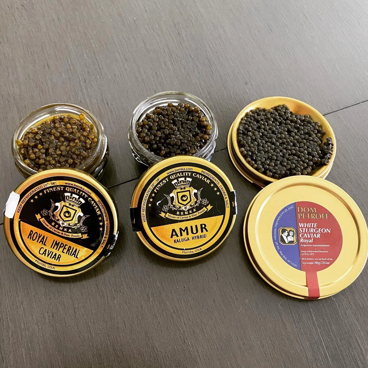 This mornings tasting. The winner is Amur Kaluga Hybrid. Dom Petroff White sturgeon too briny, Amur Royal imperial has a  lovely golden color but a bit more oil than I like , the Kaluga Hybrid is firm, earthy with medium eggs, brown /golden brown....