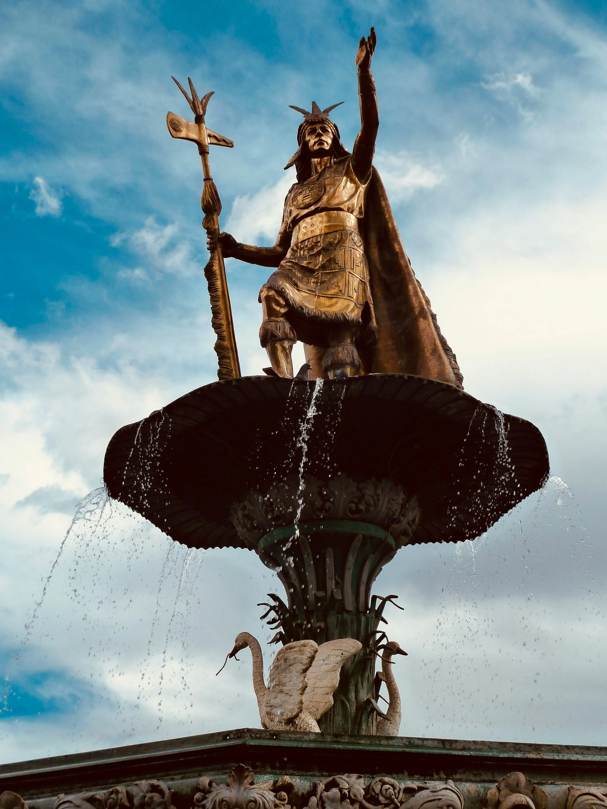 The statue of Inca ruler Pachacútec rises above the fountain in Cusco’s historic Plaza de Armas.