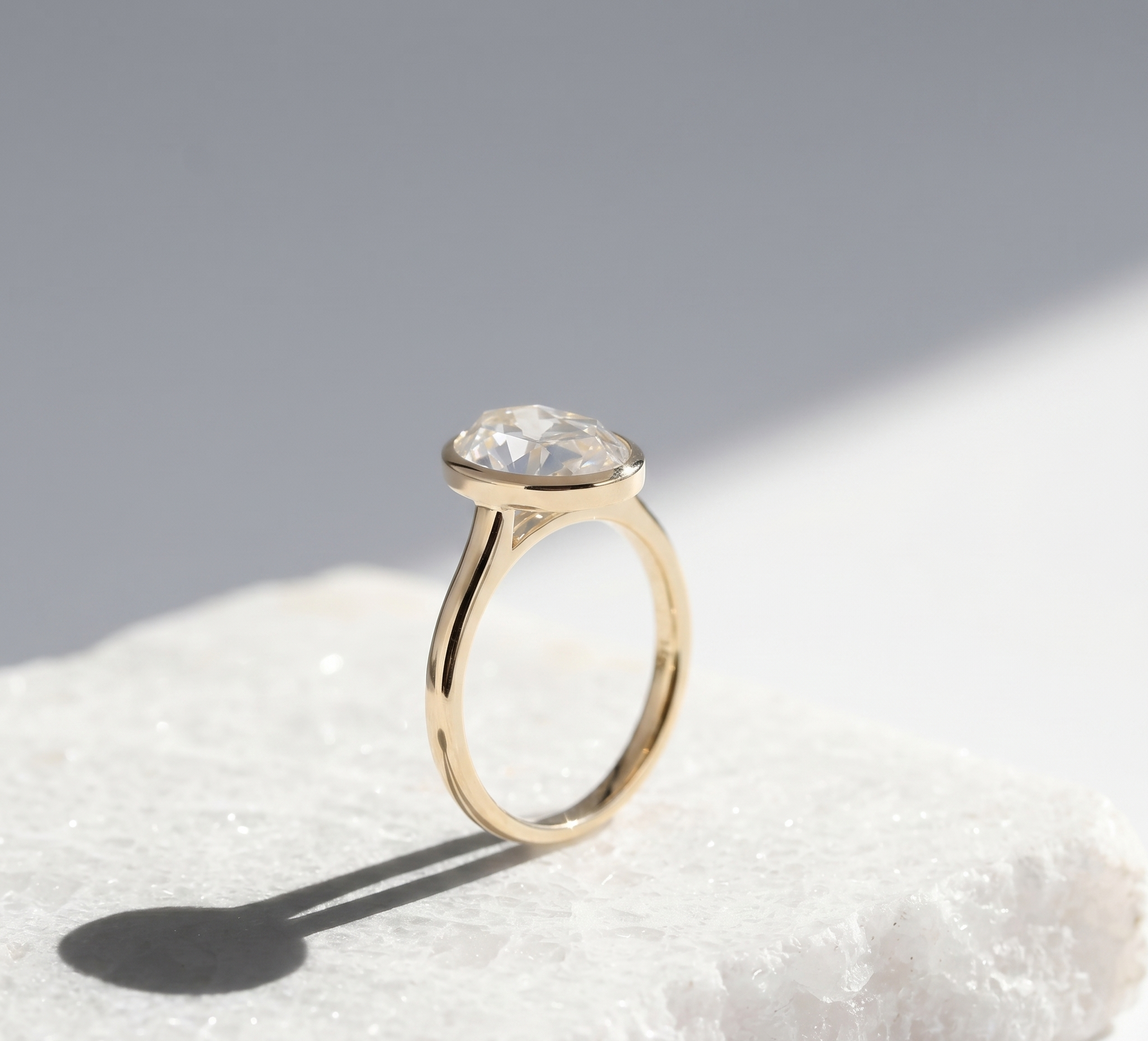 11 Oval Bezel Solitaire 004 RS 318 YG Side 2.png