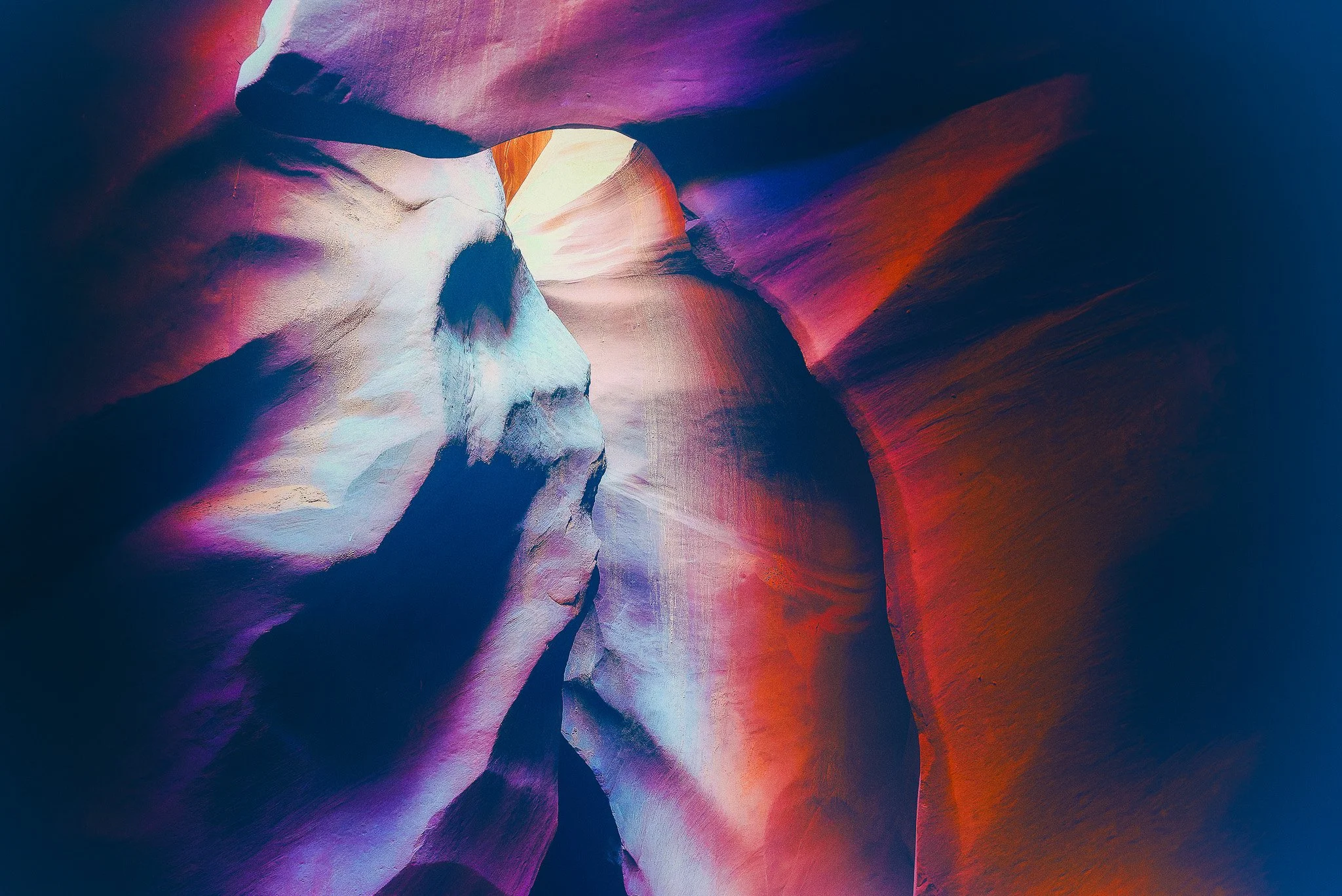 A vast, wide-angle perspective of a primordial natural environment, exhibiting deep focus and structural geometry from the foreground textures to   the distant, enduring horizon line.