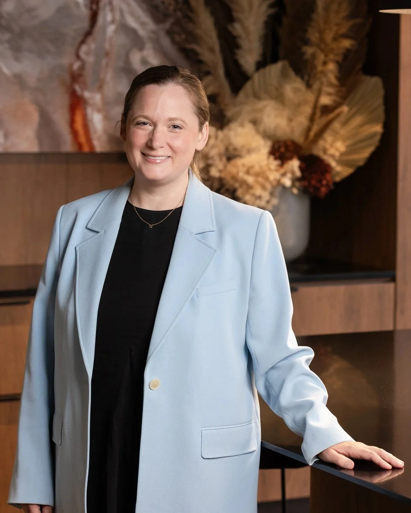Tess Hauser Hi Res Headshot 2026.jpg