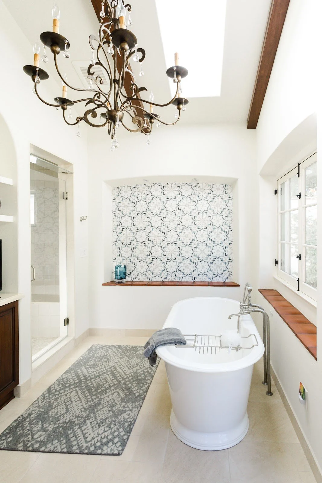 Hallway with a sliding wood barn door leading to the backyard