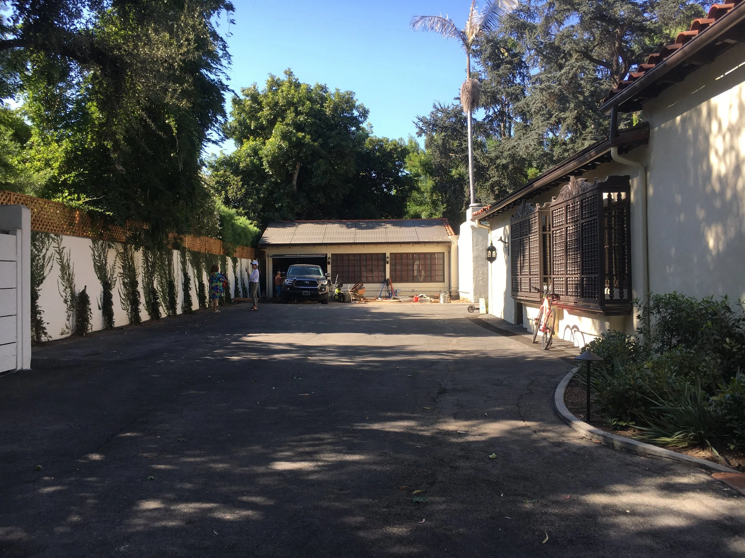 Long driveway leading to the detached garage before renovation