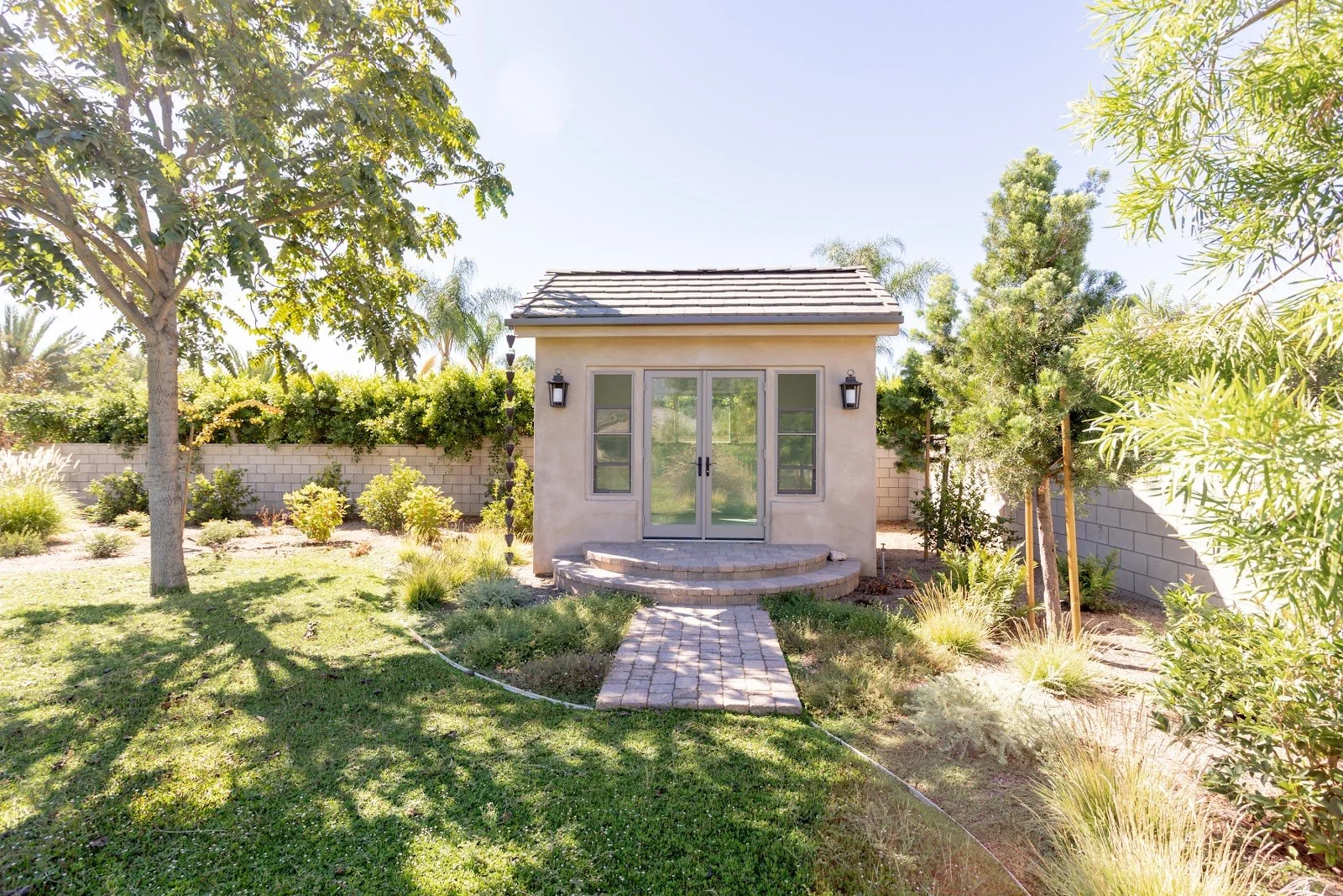 Stone facade and drought-tolerant landscaping at the Summer House