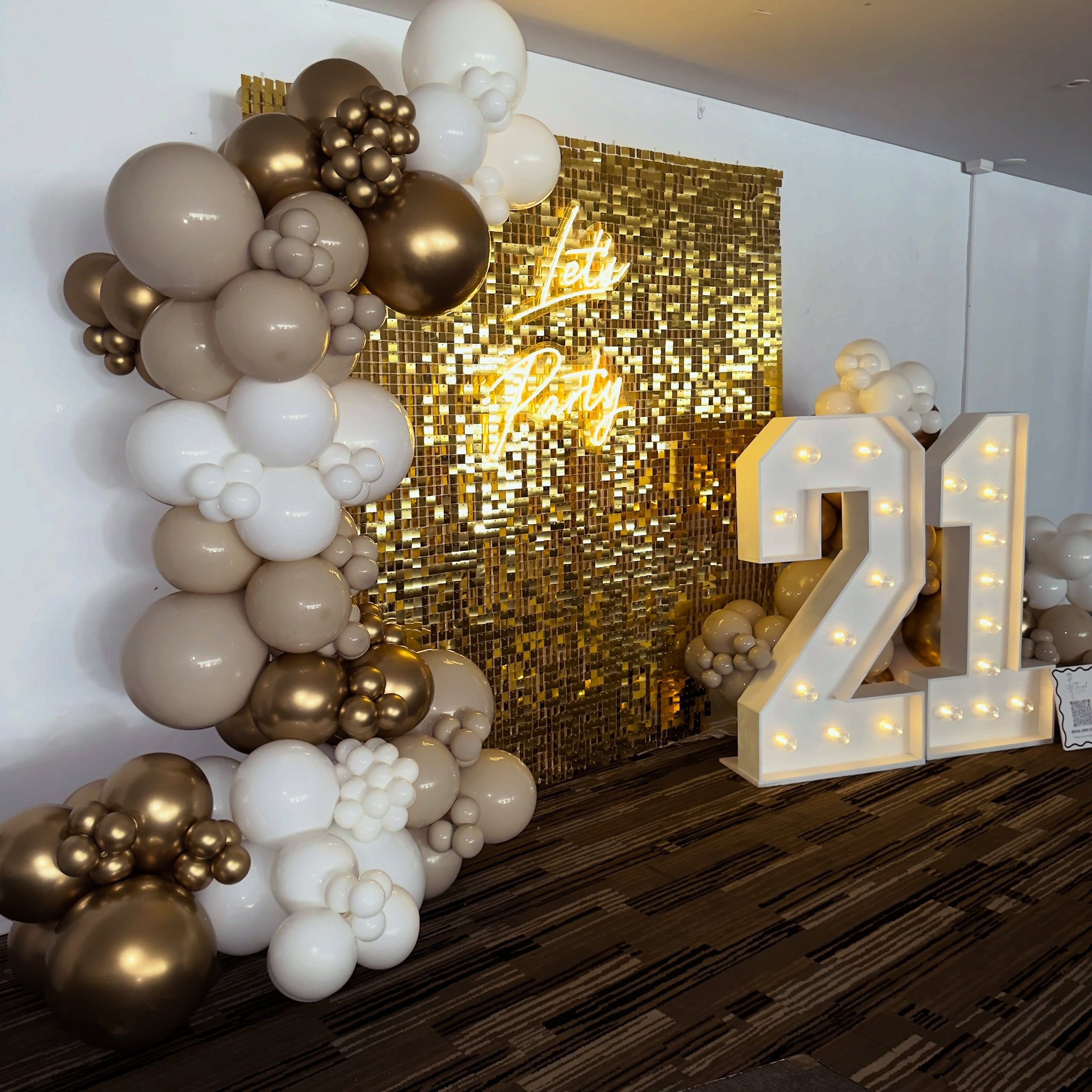 Not every setup needs a million colours or over the top styling to make an impact ✨

This one was all about keeping it classy, soft neutrals, warm gold tones, layered textures and those glowing marquee numbers stealing the show 🤍✨

#goldcoasteventst