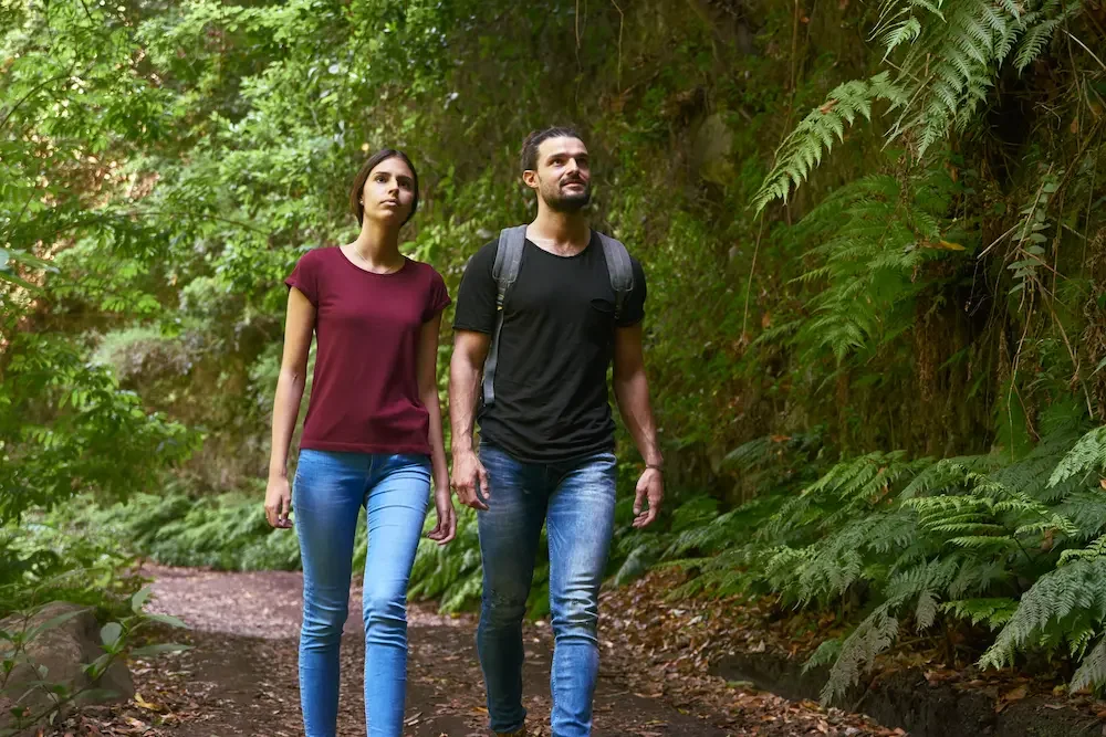 Couple walking in nature, representing everyday movement, wellbeing and therapeutic bodywork support for clients in Nelson and Tasman.