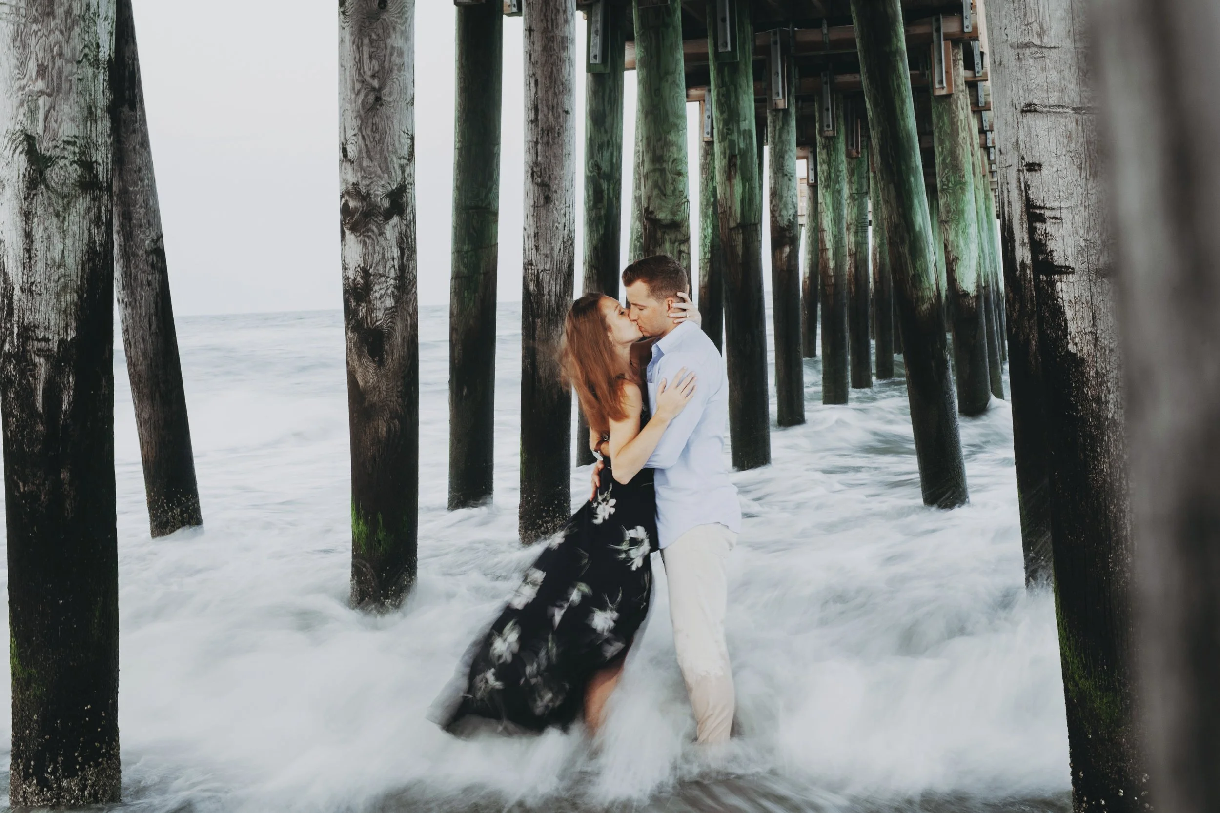 Emily and Christian braved the ocean waves for this awesome pic under the iconic pier in Avalon, New Jersey. #philadelphiaweddingphotographer #philadelphiaweddingphotography #phillyweddingphotographer #fromphillywithlove #visitphilly #phillyphotograp