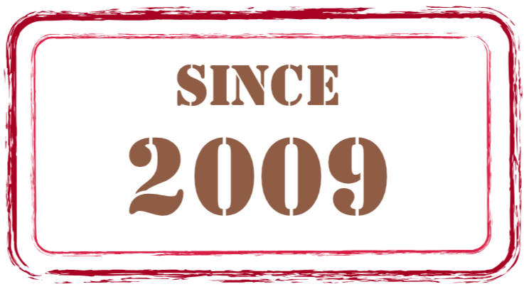 Un panneau lumineux rouge avec le texte 'ENTRÉE 200' en lettres dorées.