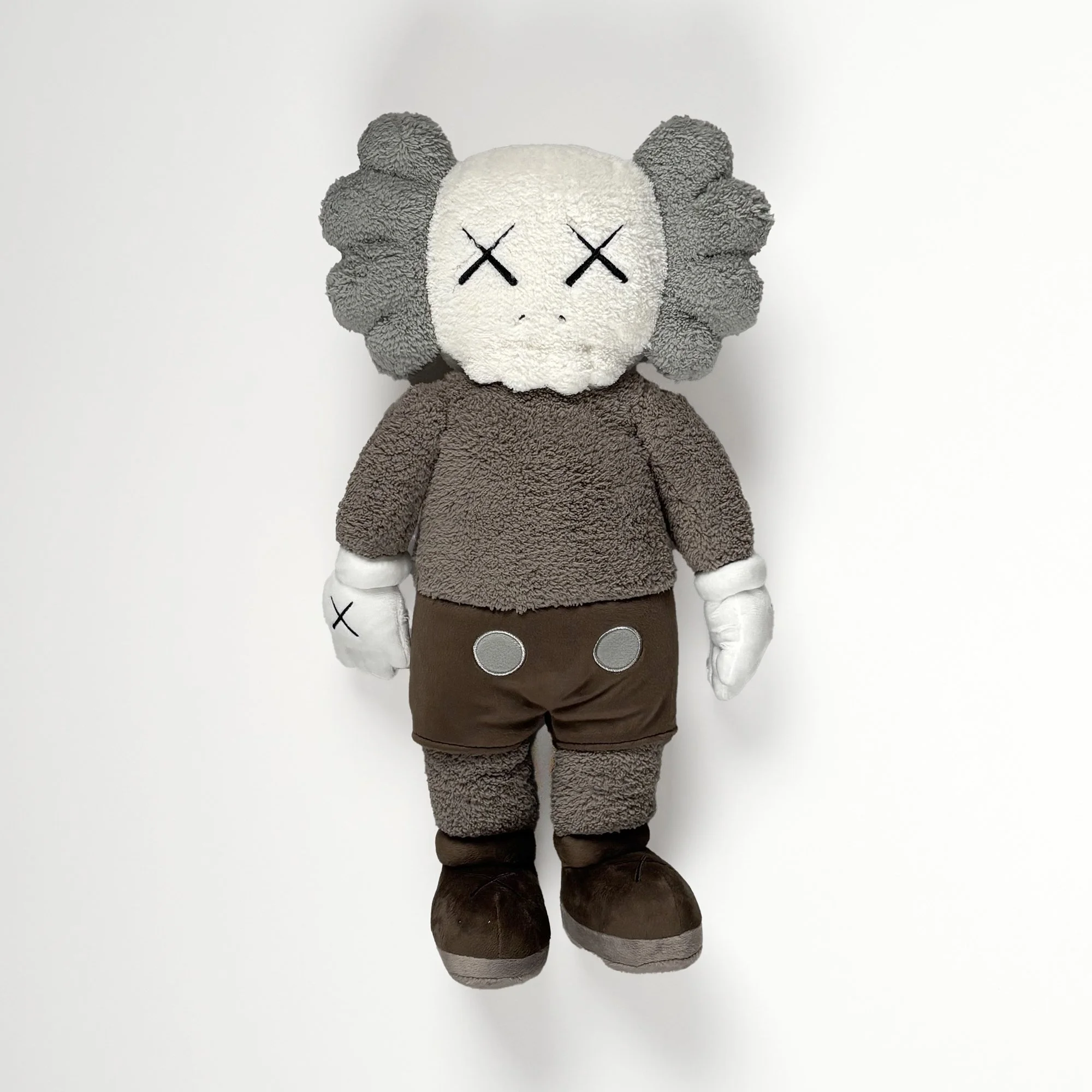 KAWS Hong Kong Holiday Plush, 2019, brown, front view