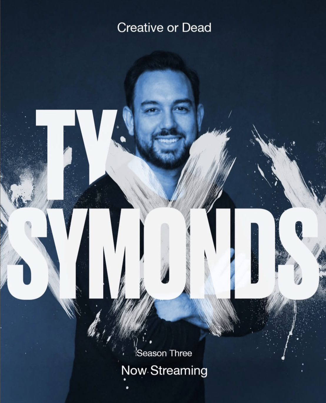 Promotional poster for a podcast titled "Creative or Dead," featuring a smiling man with dark hair and a beard, with white paint splash graphics and text indicating it is season three now streaming.