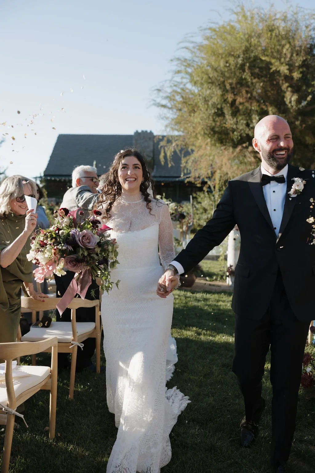 a Jasper and Lane Events bride and groom a leading recessional