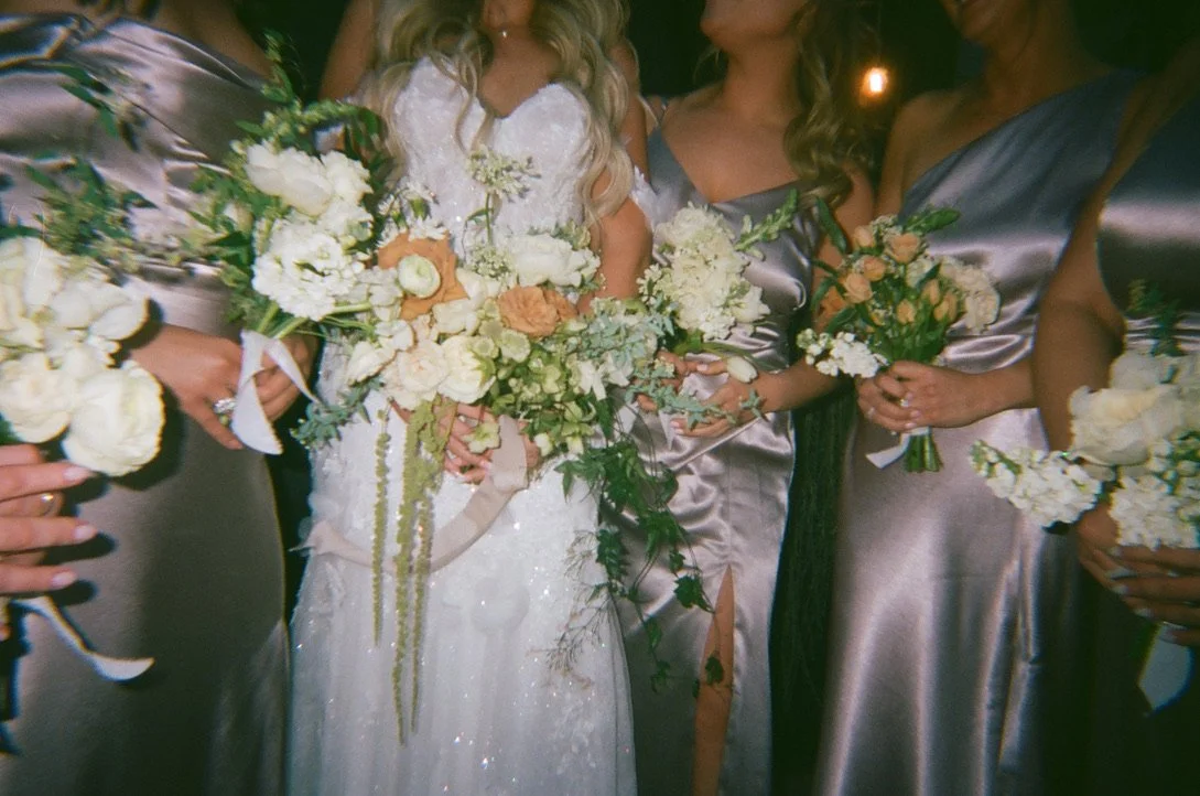 Jasper and Lane wedding in San Diego with a detail portrait of bride and her bridesmaids with their bouquets