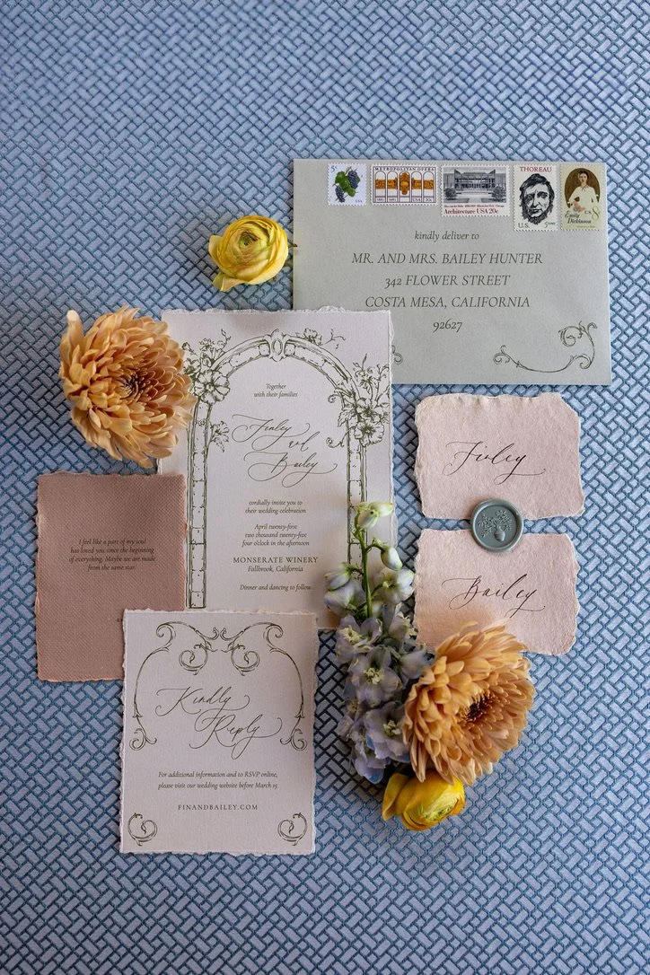 a close up detail of a flatlay with an invitation suite for a Jasper and Lane Events wedding at Monserate Winery