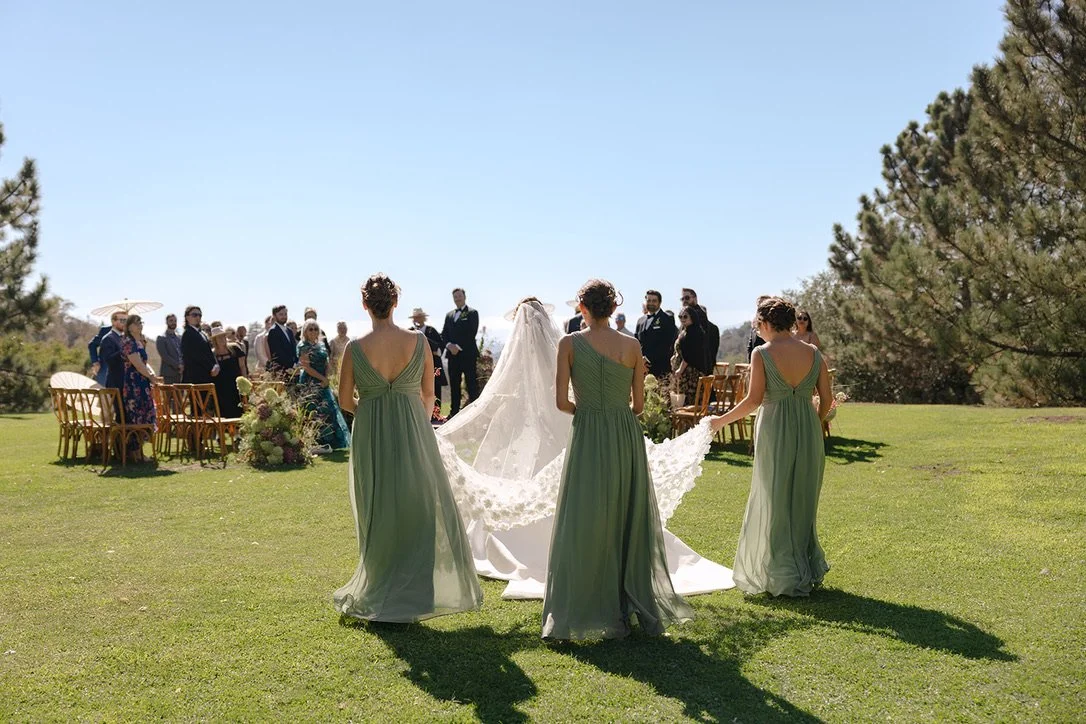bride-bridesmaids-ceremony-mountain-luxury-wedding.jpeg