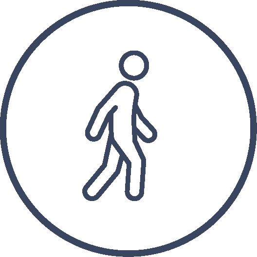 A simple line drawing of a person walking, enclosed in a circle.