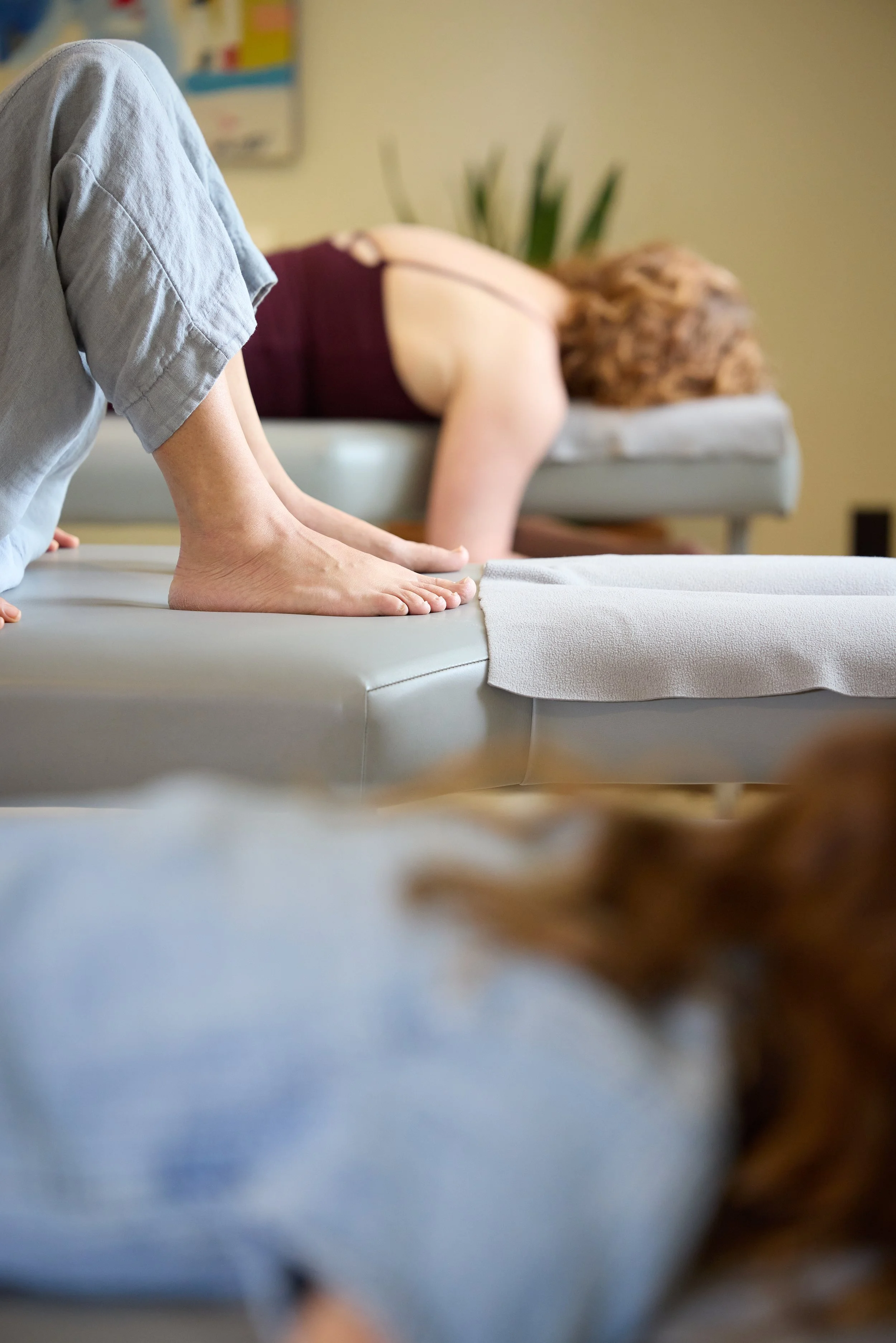 Wellness client experiencing gentle spinal care