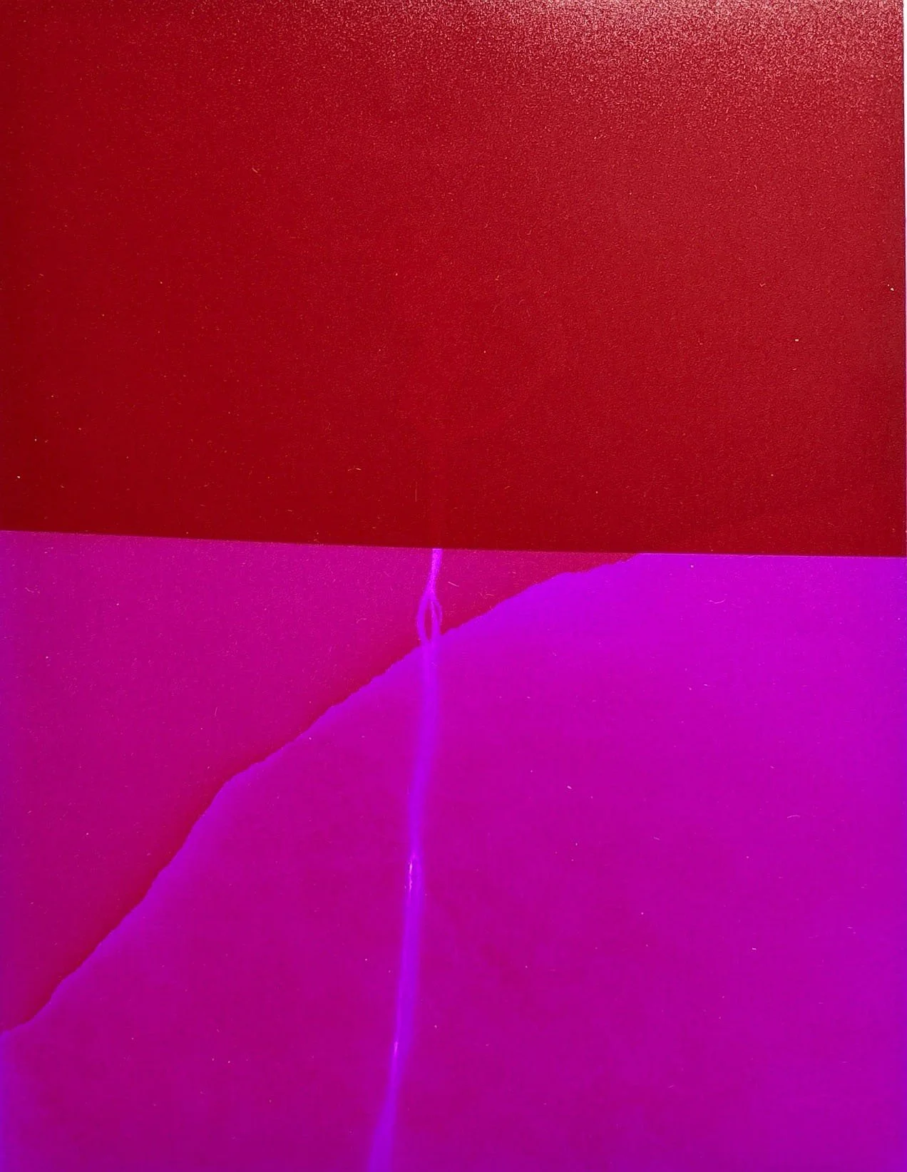 A colorful abstract image with a large red rectangle at the top, a purple section at the bottom, and a thin purple lightning bolt-like streak in the center.