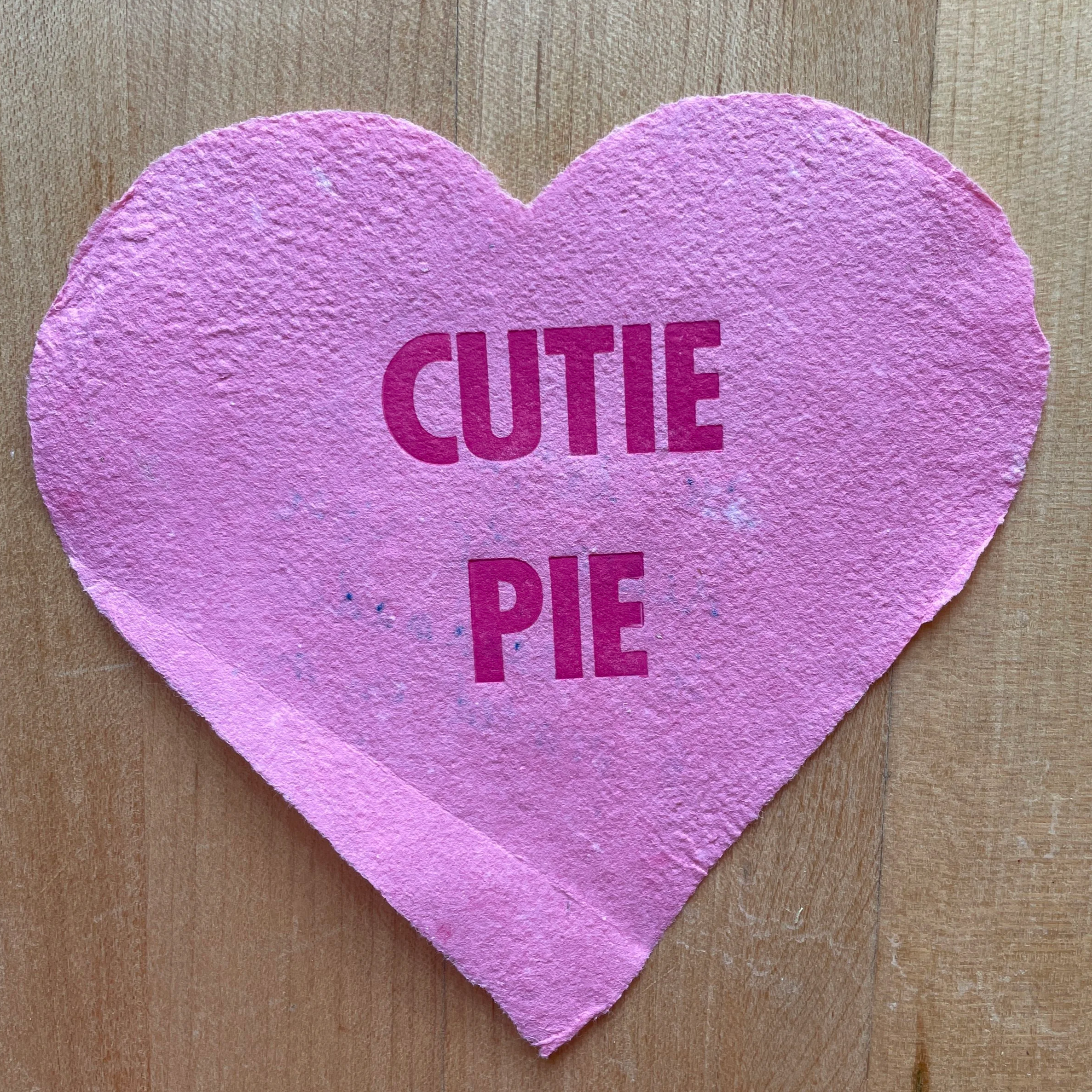Handmade paper and printed letter heart, by Becky Mutrux