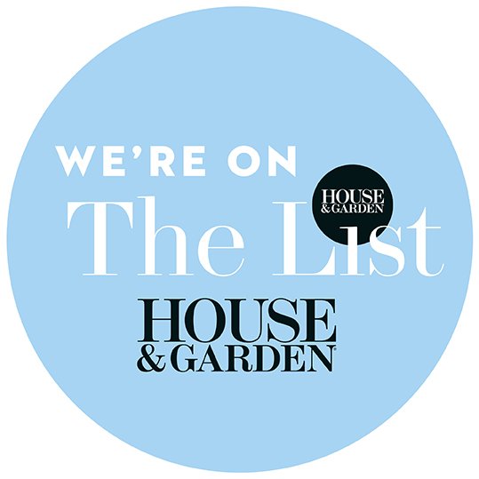 Blue circular graphic with white and black text promoting HOUSE & GARDEN's The List.