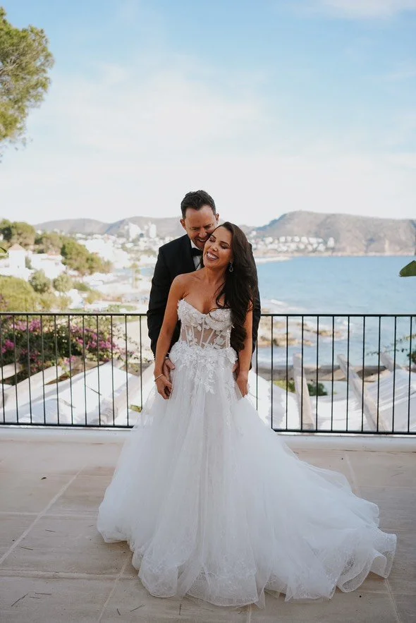 Destination wedding couple at a luxury villa in Moraira with panoramic Mediterranean and El Portet views