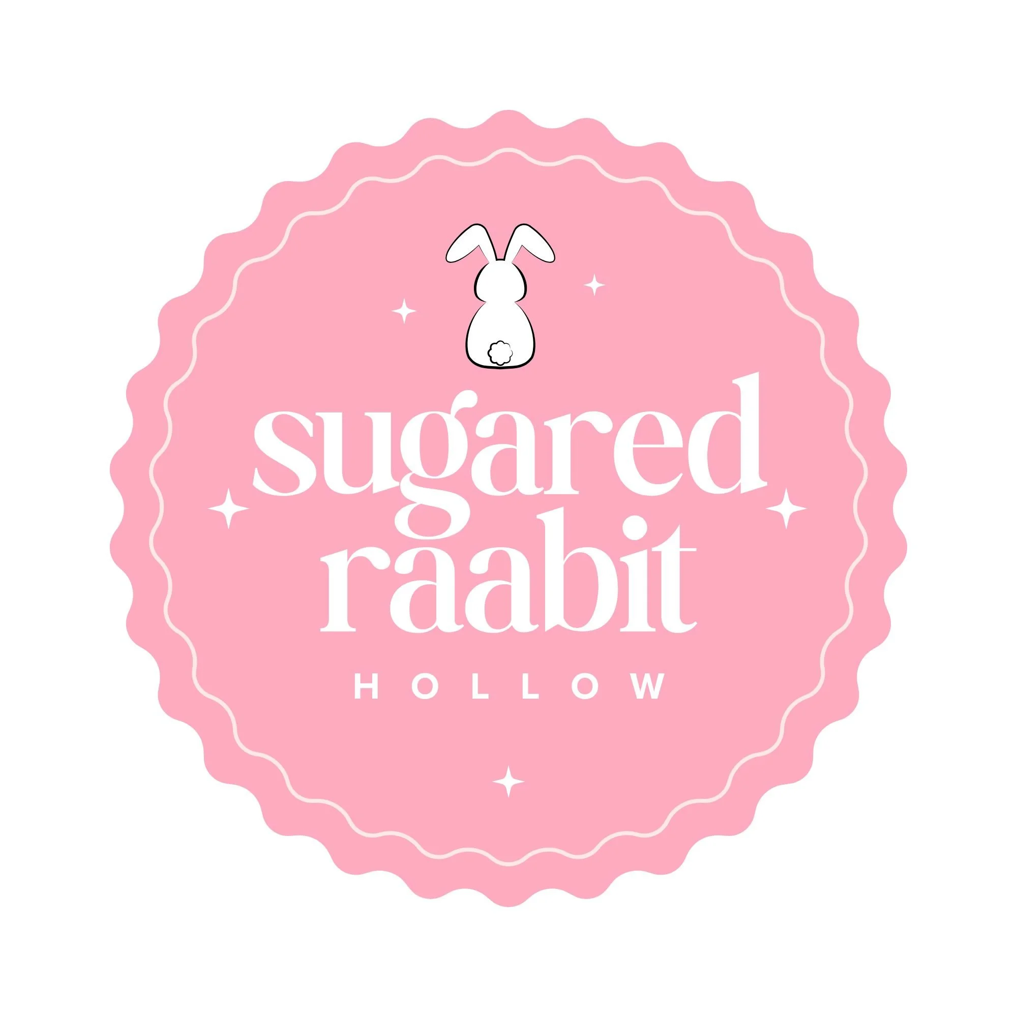 Pink badge with scalloped edge, white text that reads 'sugared', small bunny icon with a fluffy tail, sparkles, and the name 'Hollow' at the bottom.
