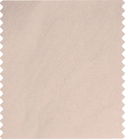 A blank, beige-colored postage stamp with perforated edges.
