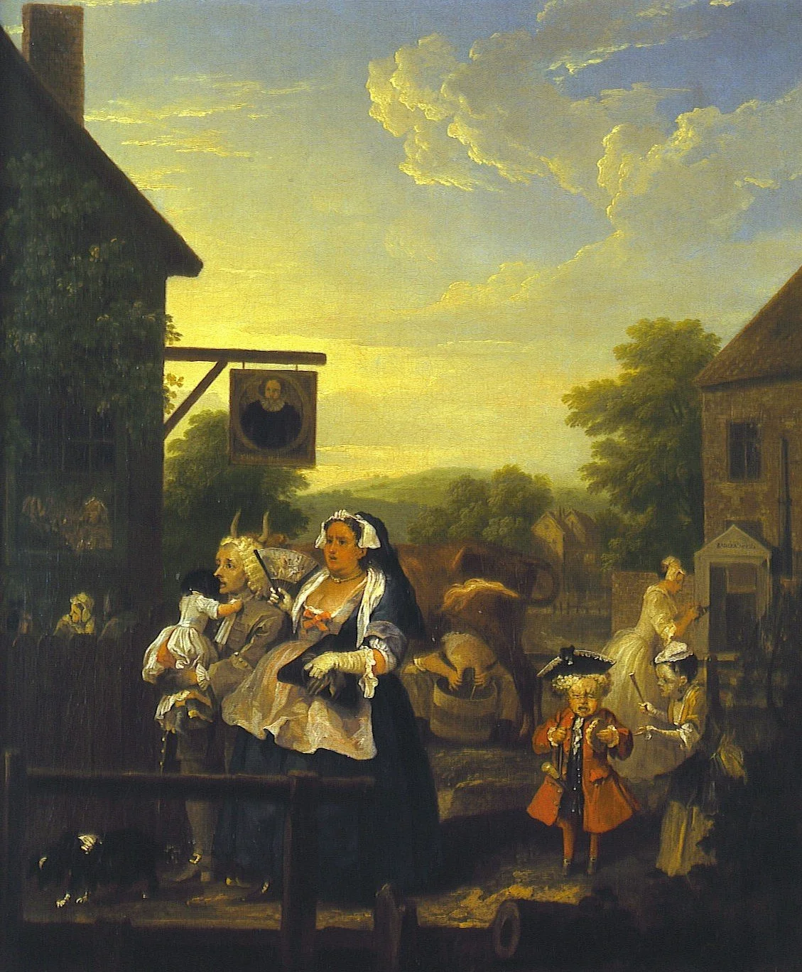 A painting depicting 18th-century rural life with people and children engaging in leisure activities outside a village, during sunset or early evening. Hogarth’s ‘Evening’ showing Sir Hugh Myddelton’s Head, 1738.