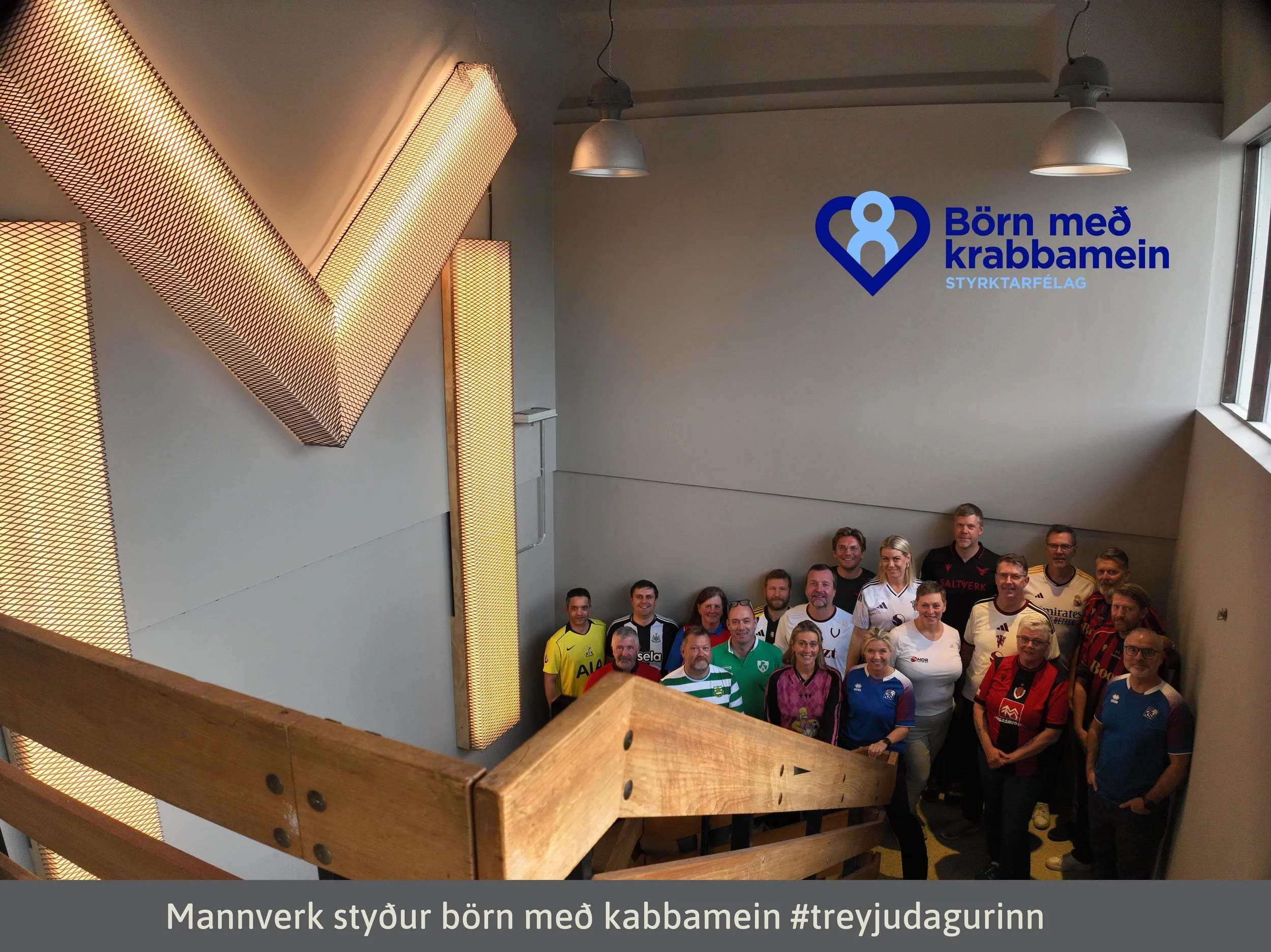 Mannverk team wears jerseys to work supporting kids with cancer