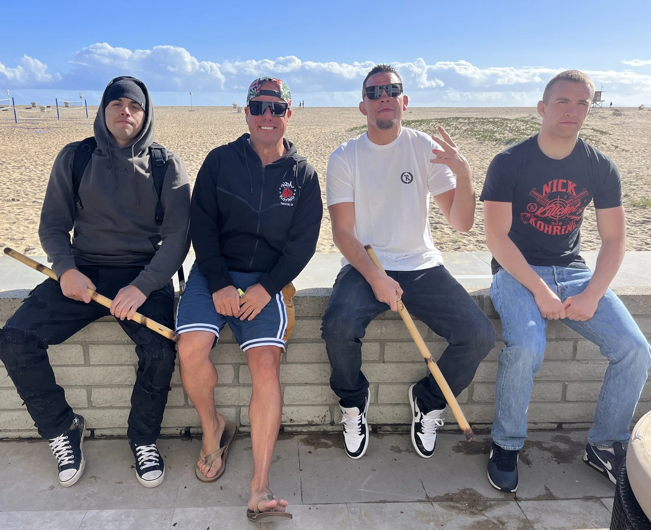 Friends enjoying a sunny afternoon at Newport Beach, California, on the Balboa Peninsula.
