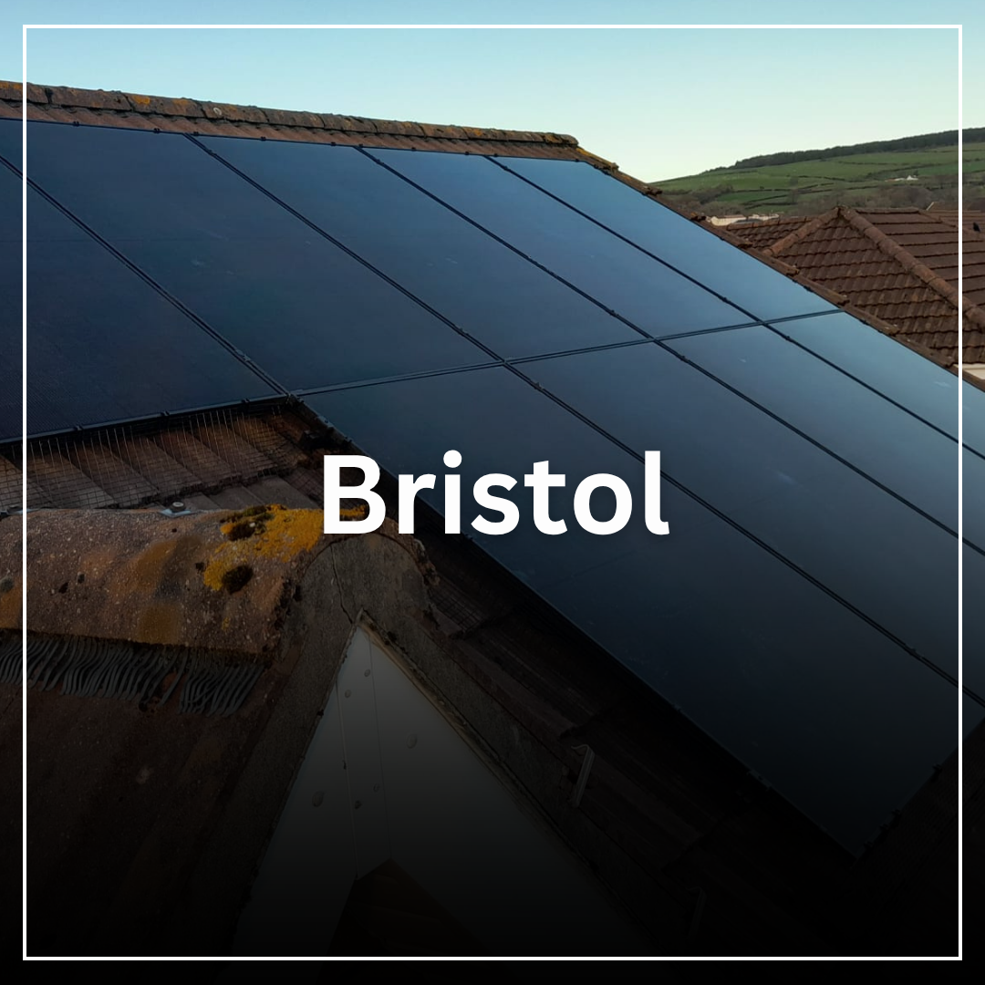 Solar panels installed on the roof of a building in Bristol, with a rural landscape in the background.