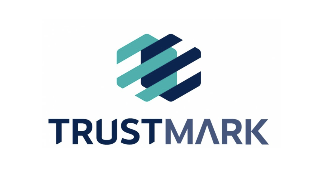 Trustmark logo featuring a geometric emblem above the word 'TRUSTMARK' in bold blue letters.