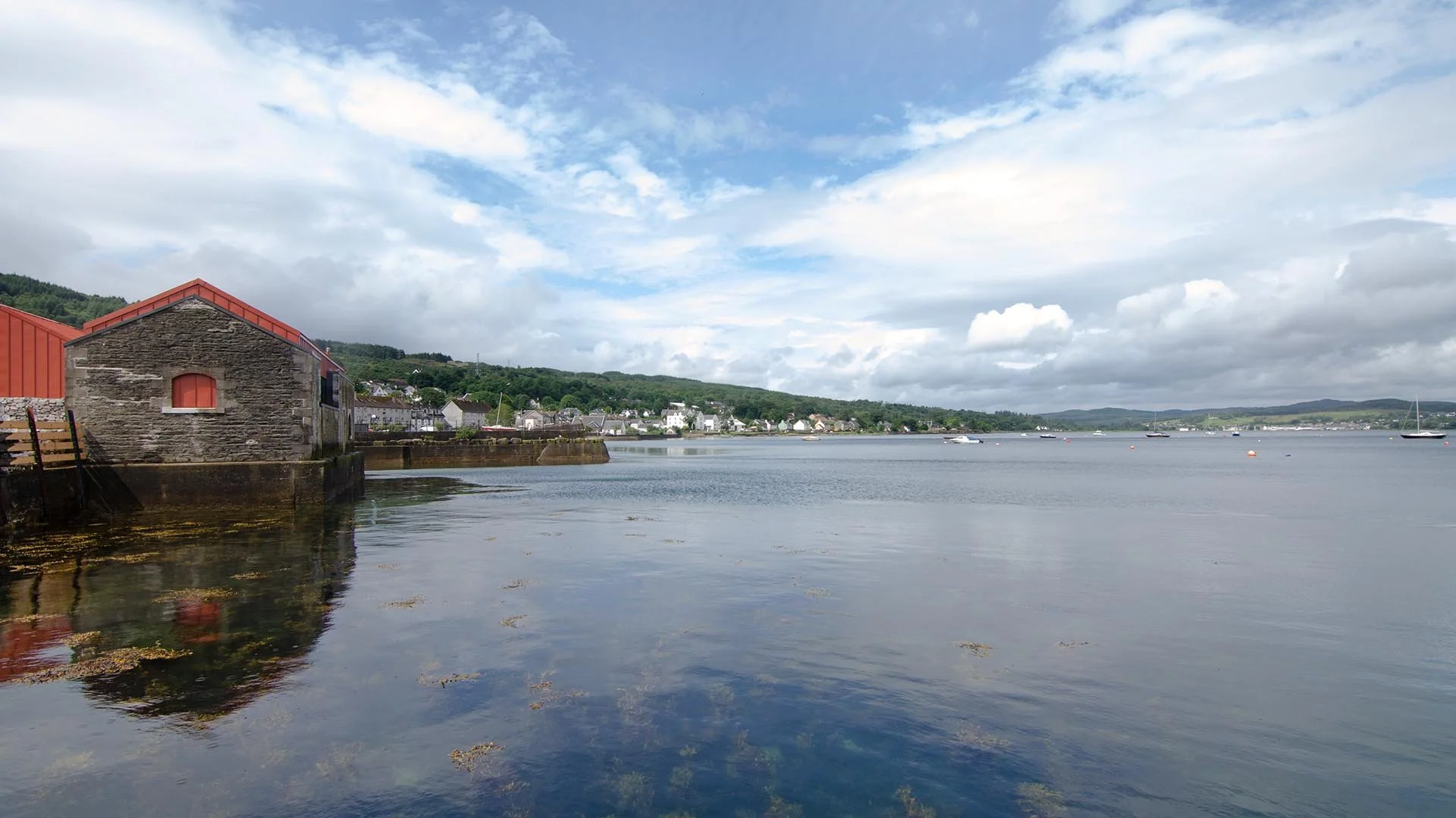 Exterior of The Egg Shed sitting directly along the water's edge at Ardrishaig, overlooking Loch Fyne.