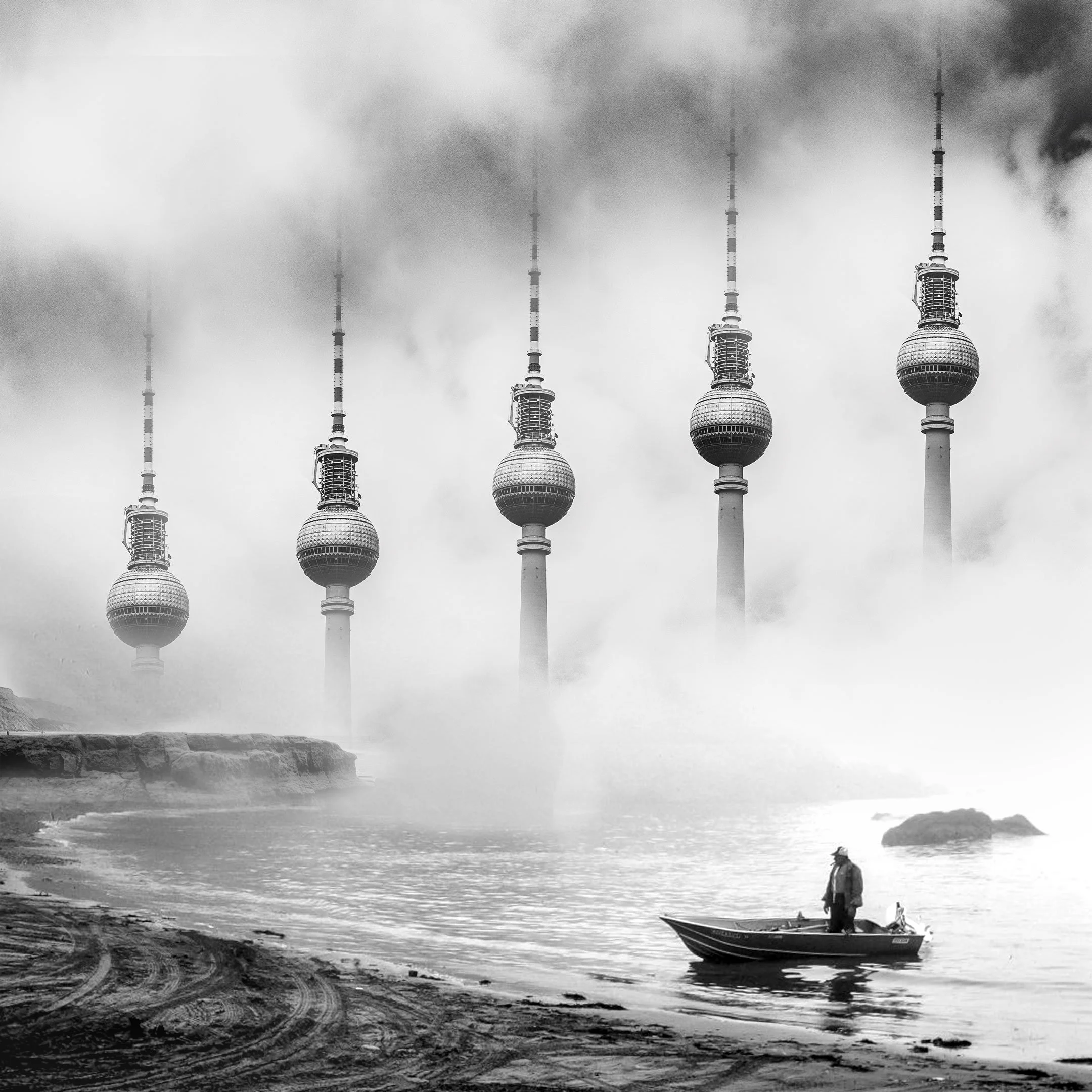 A person in a small boat on a body of water with a large, cloudy sky overhead and tall towers with antennae in the background.