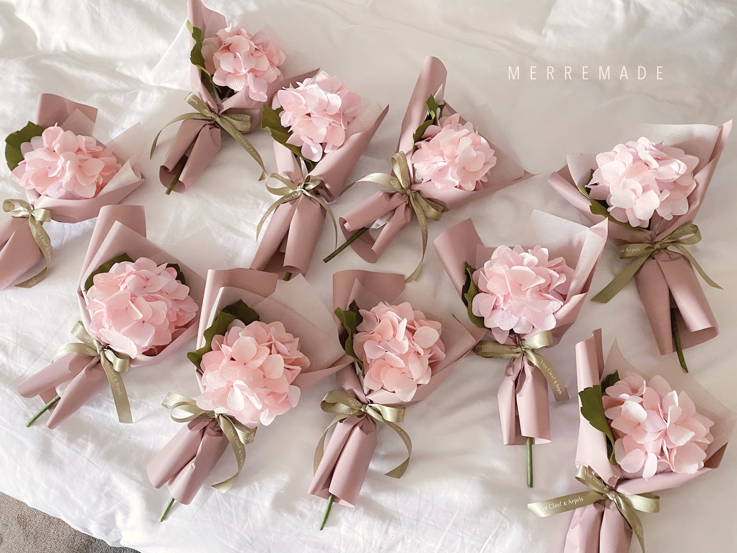 Jasmine Sing, paper artist from Merremade handcrafted these paper hydrangea bouquets for Van Cleef & Arpels Singapore.