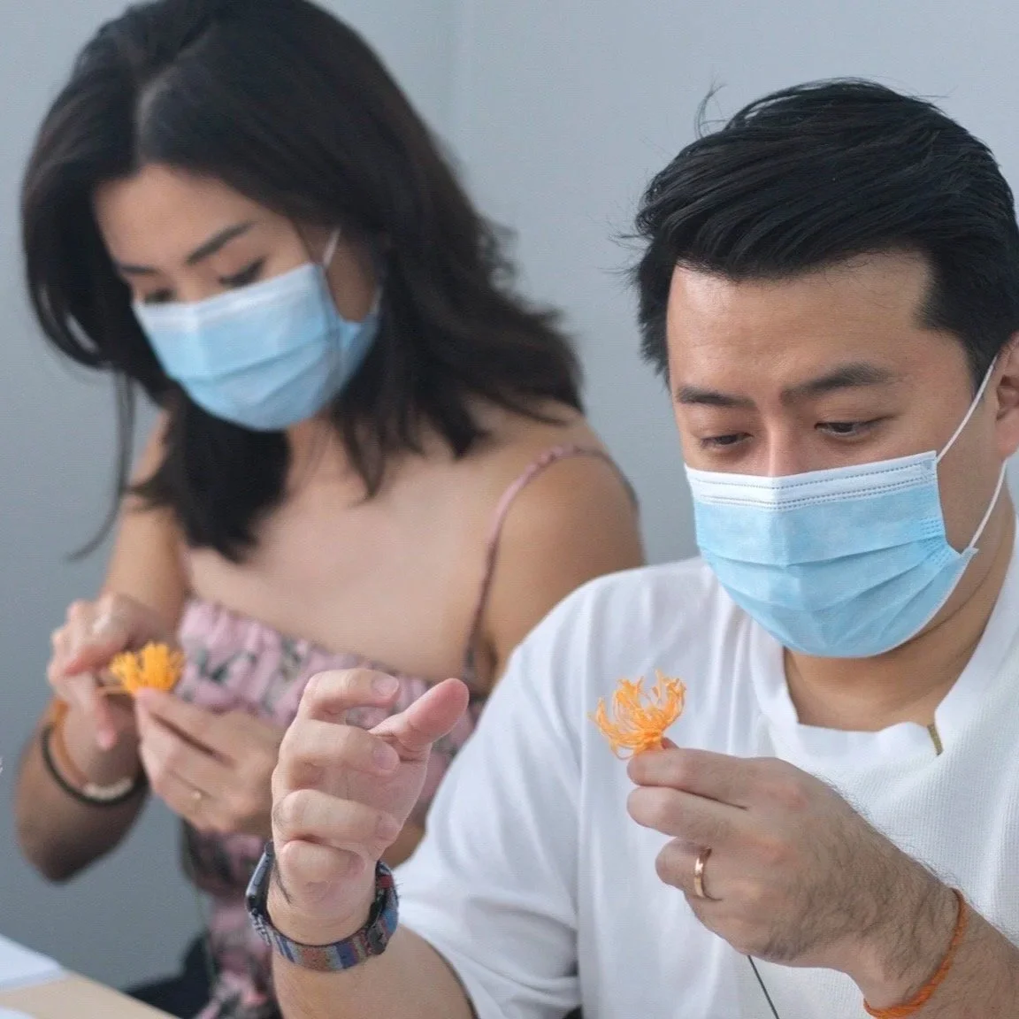 Married couple, weekend date in person workshop in Seoul Korea. Making handmade paper flowers together.
