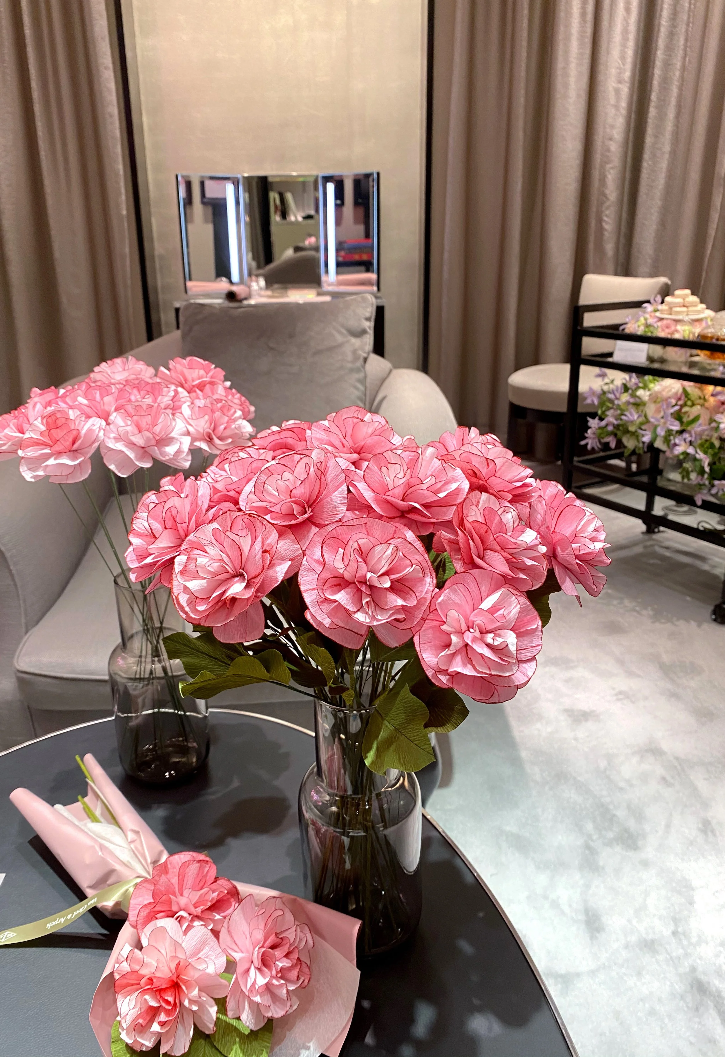 Realistic paper carnations handcrafted by Jasmine Sing, paper artist from Merremade for Van Cleef & Arpels Singapore event. 