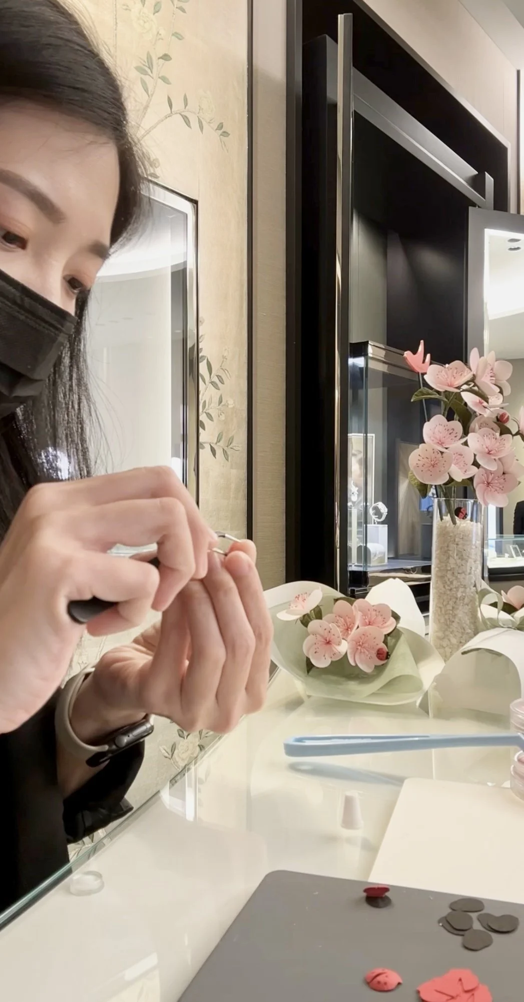 Jasmine Sing, paper artist from Merremade crafting paper bugs and paper flowers during live demonstration at Van Cleef & Arpels Singapore boutique. 