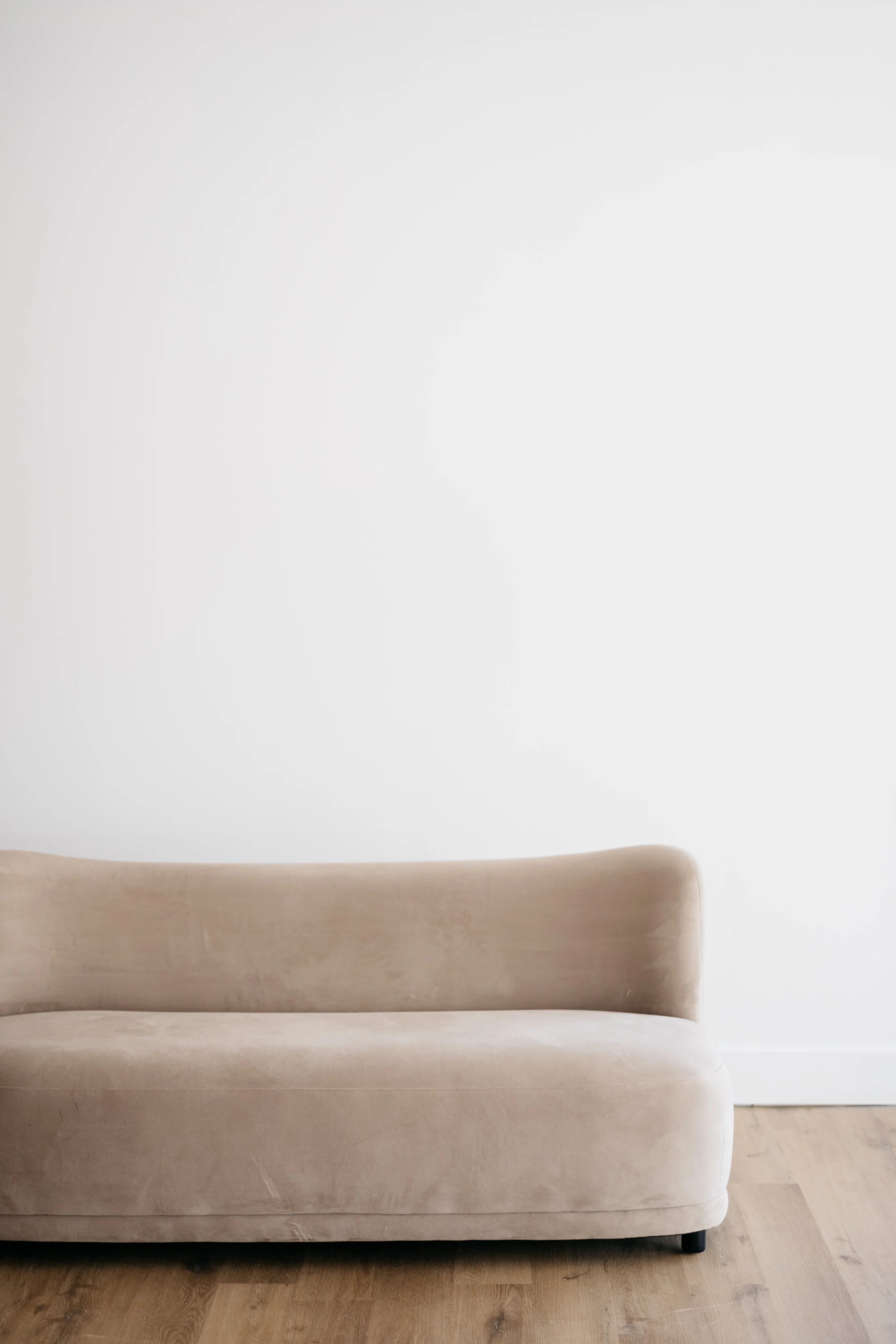 Small beige velvet sofa with rounded edges, perfect for kids!