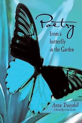 Book cover titled 'Poetry from a Butterfly in the Garden' by Annie Truesdall, featuring a large blue and black butterfly illustration against a blue background.